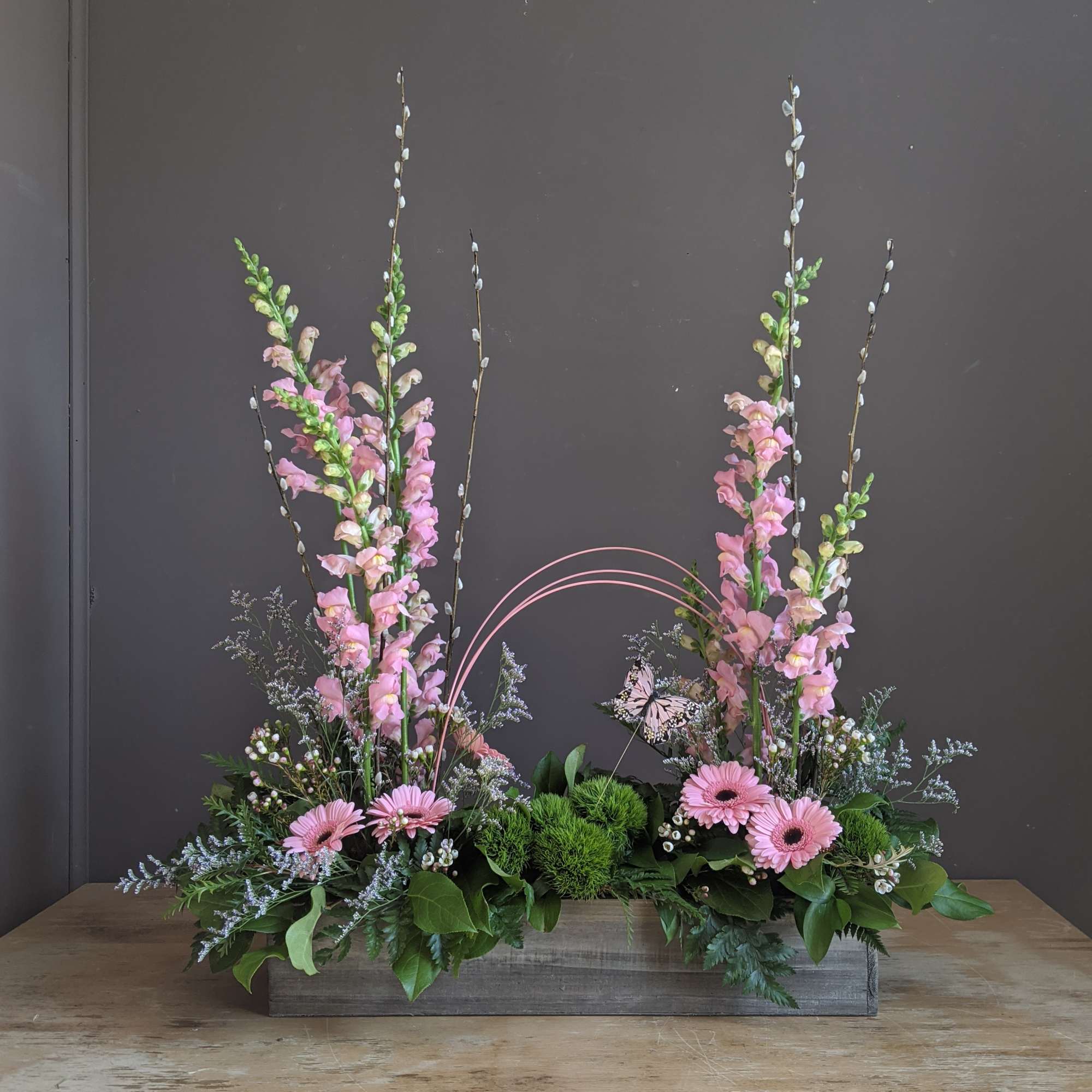 Designer&#039;s choice of seasonal cut flowers and accents to include bright and