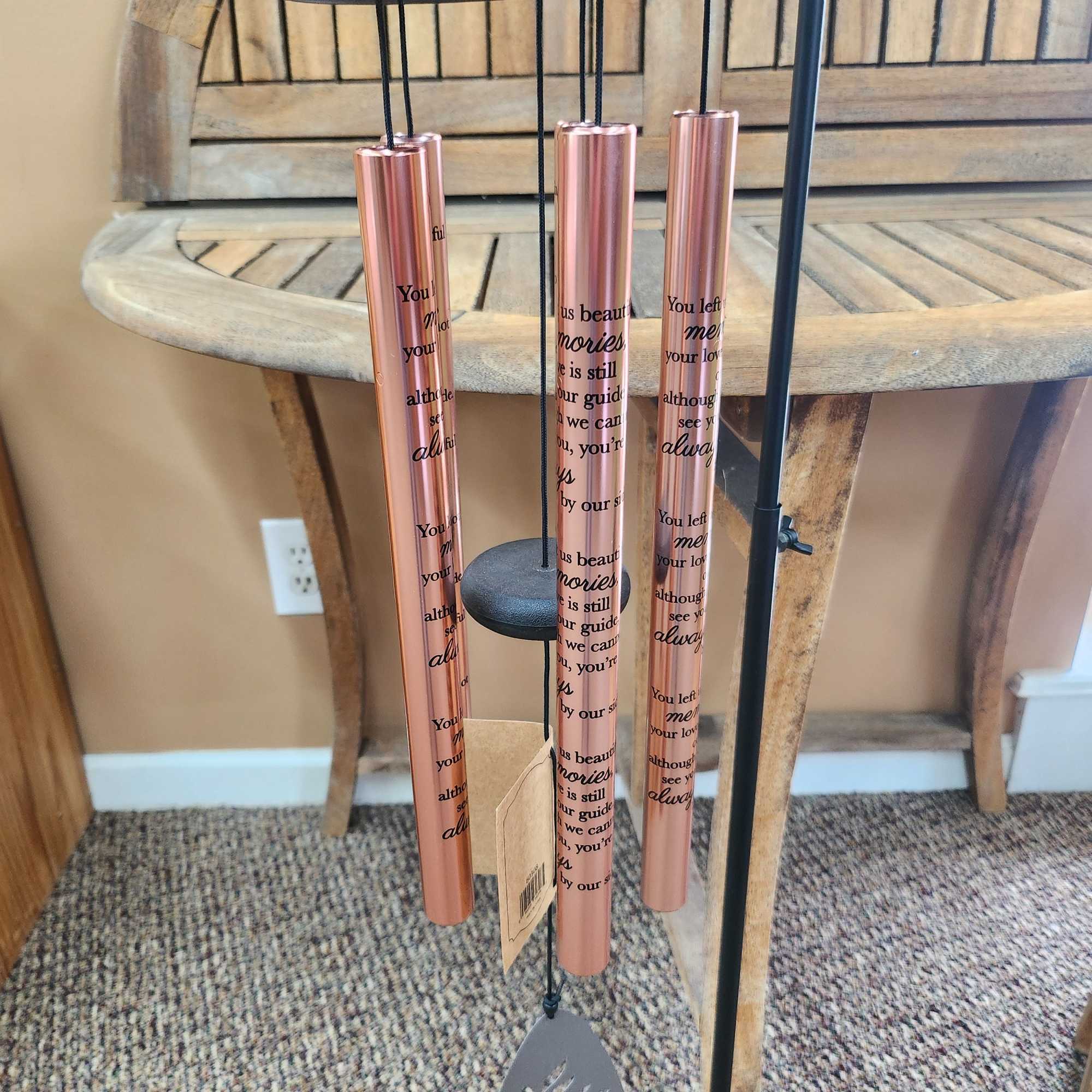 30&quot; Wind Chime On Stand 
Cames with stand, silk greenery, and bow.
Inscription