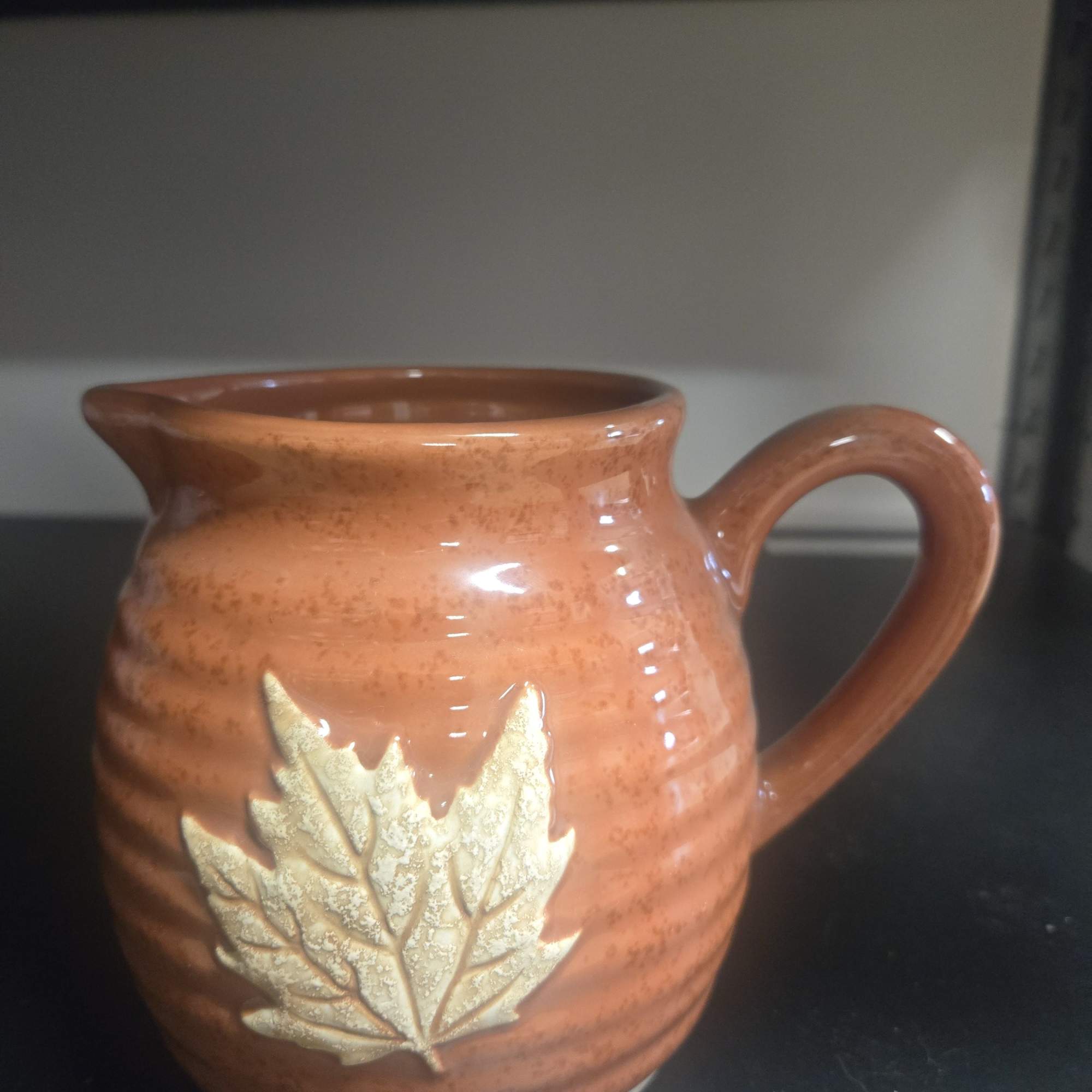  A charming autumn bouquet of roses, chrysanthemums, and seasonal blooms arranged