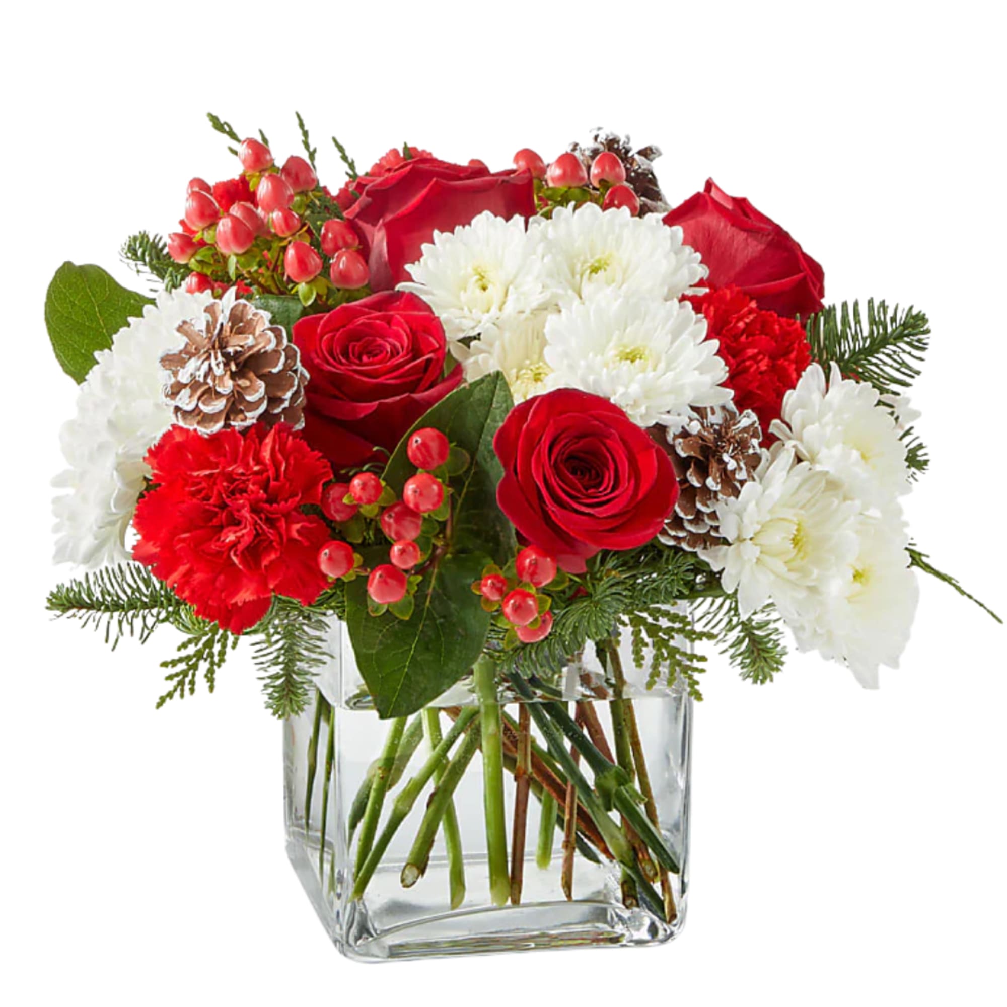 A delicate balance of red and white florals accented with seasonal greens