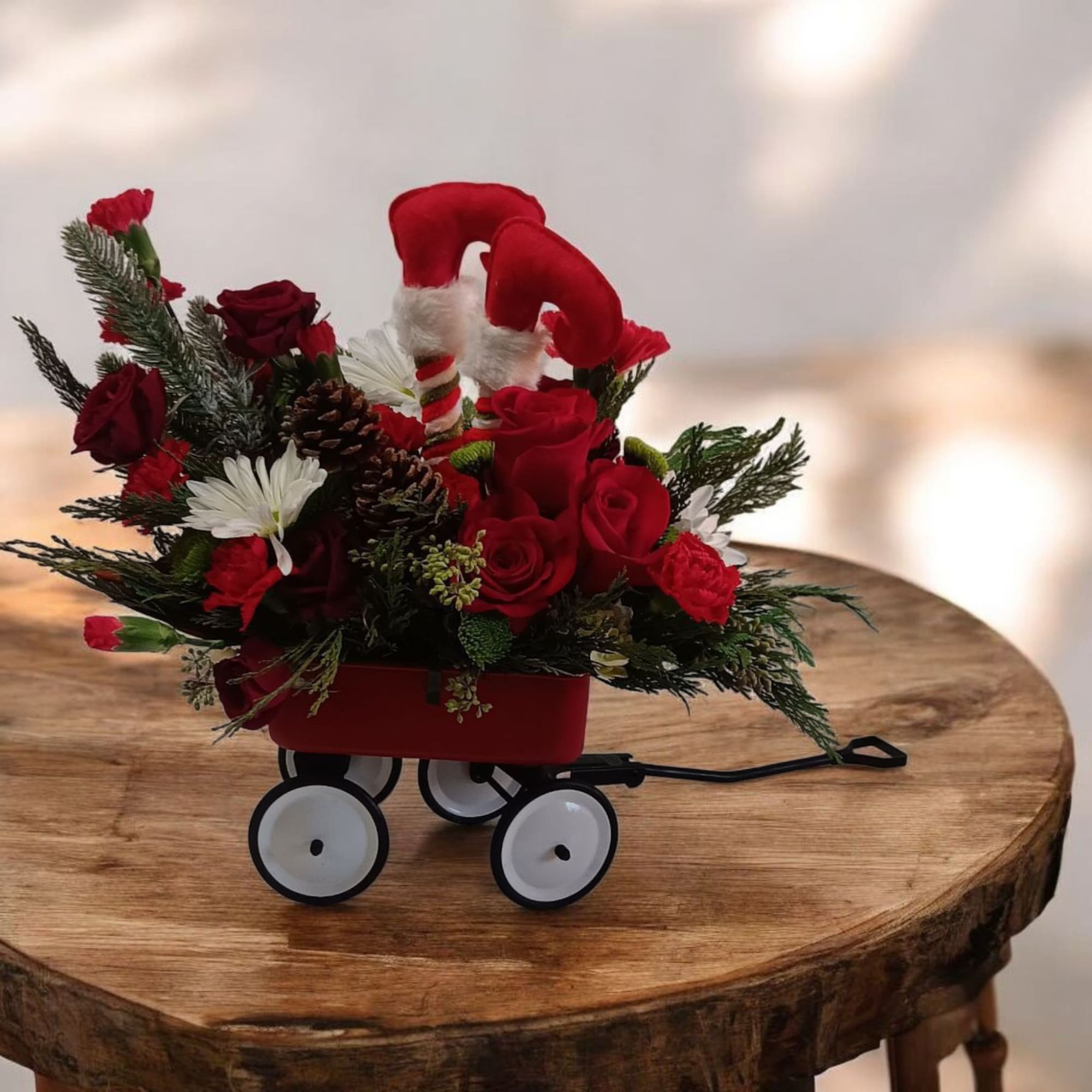 This cute red wagon brings back memories of the vintage Radio Flyer