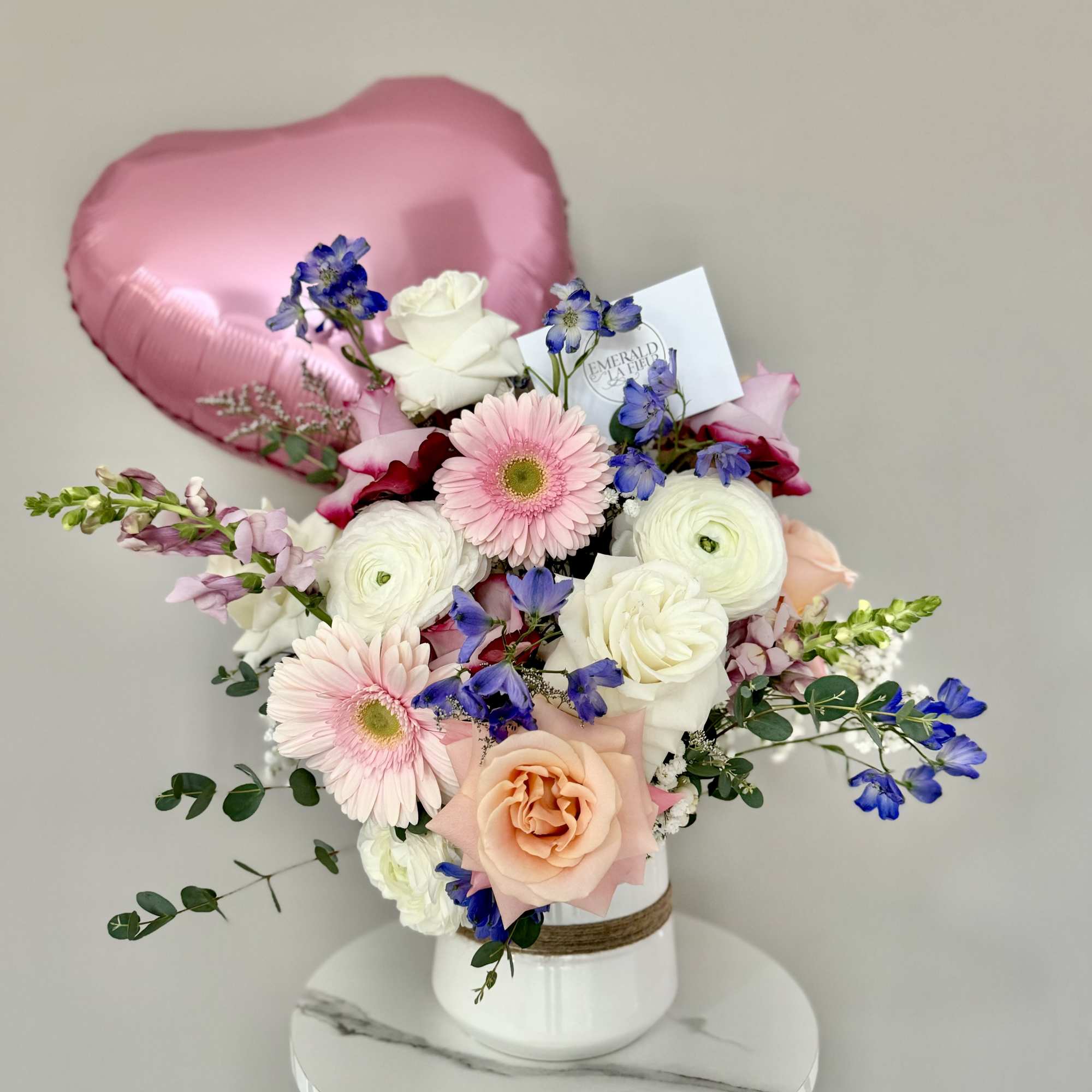 Flowers, Color, and Style chosen by the Florist. These arrangements are a