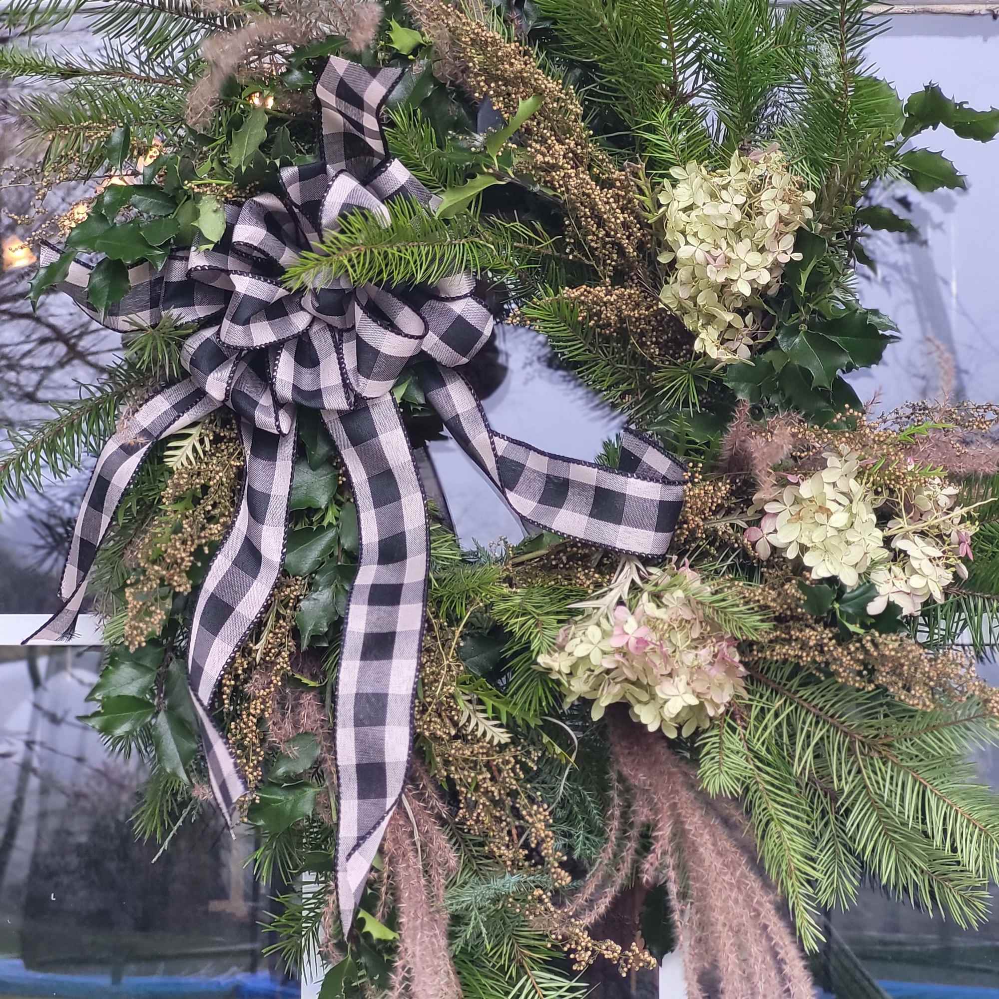 We have  a lovely assortment of handmade wreaths that incorporate naturally