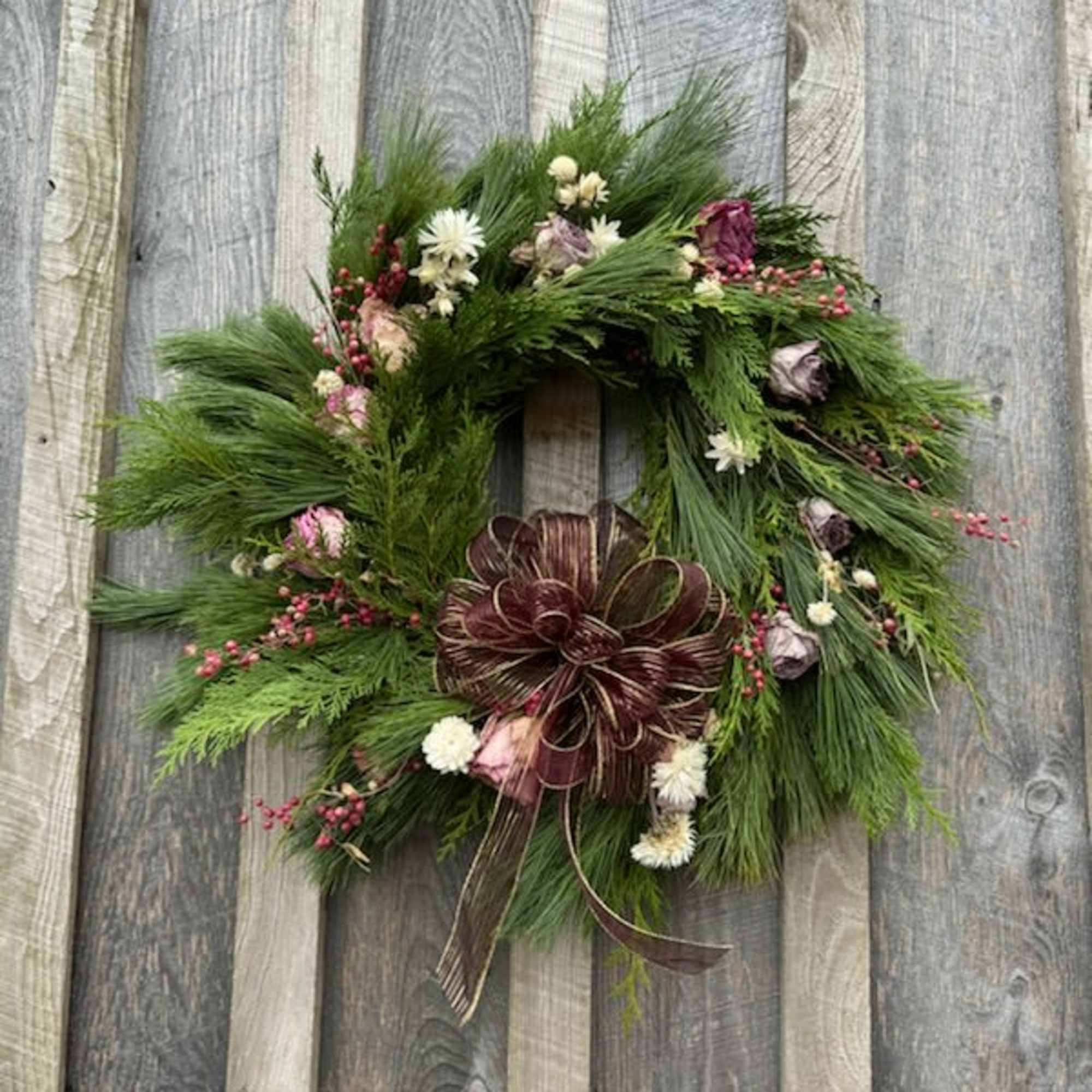 We have  a lovely assortment of handmade wreaths that incorporate naturally