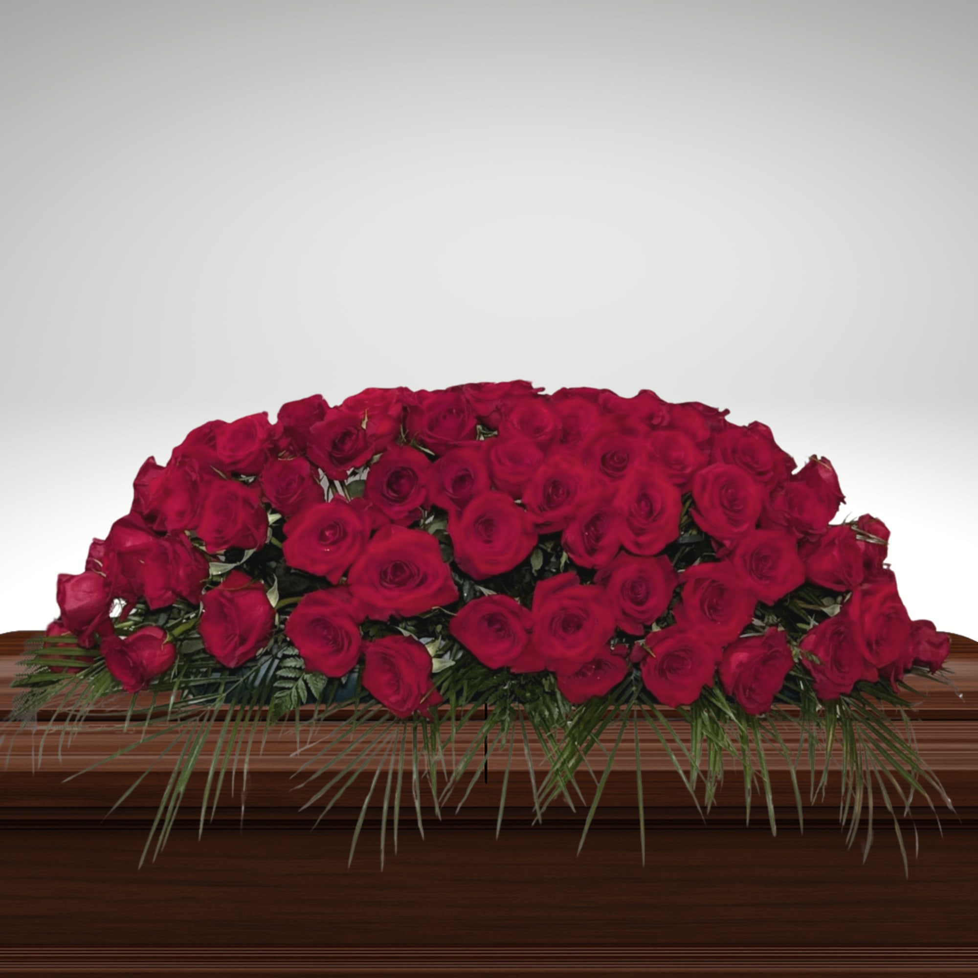 Our Red Rose Timeless Tribute casket spray is a timeless expression of