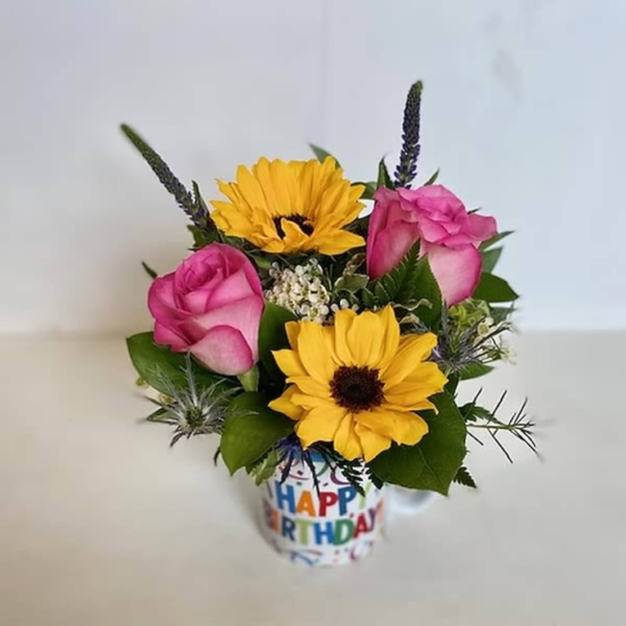 Not only is it a beautiful arrangement, once the flowers are no