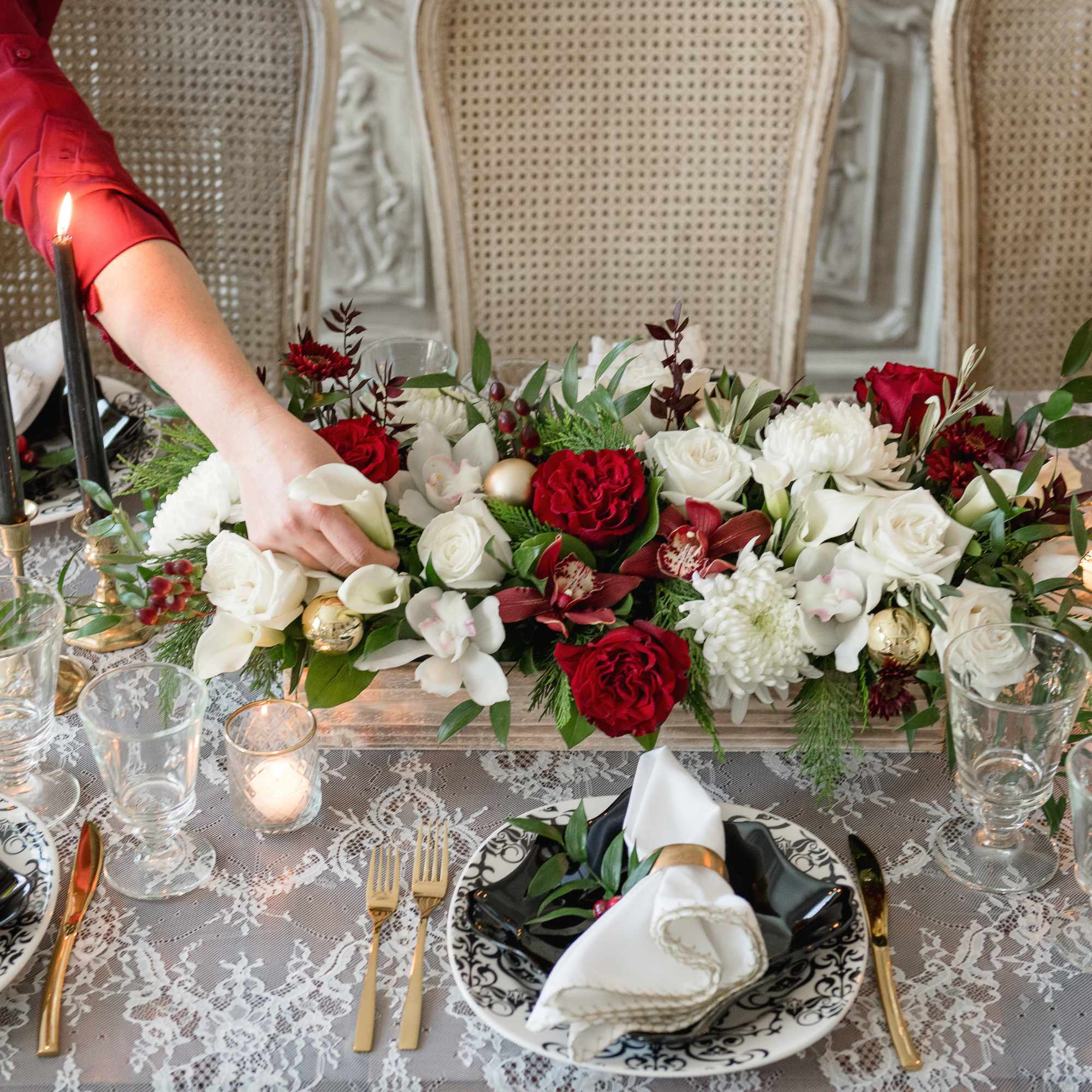 A long and showy &quot;WOW&quot; arrangement in deep reds and classic white