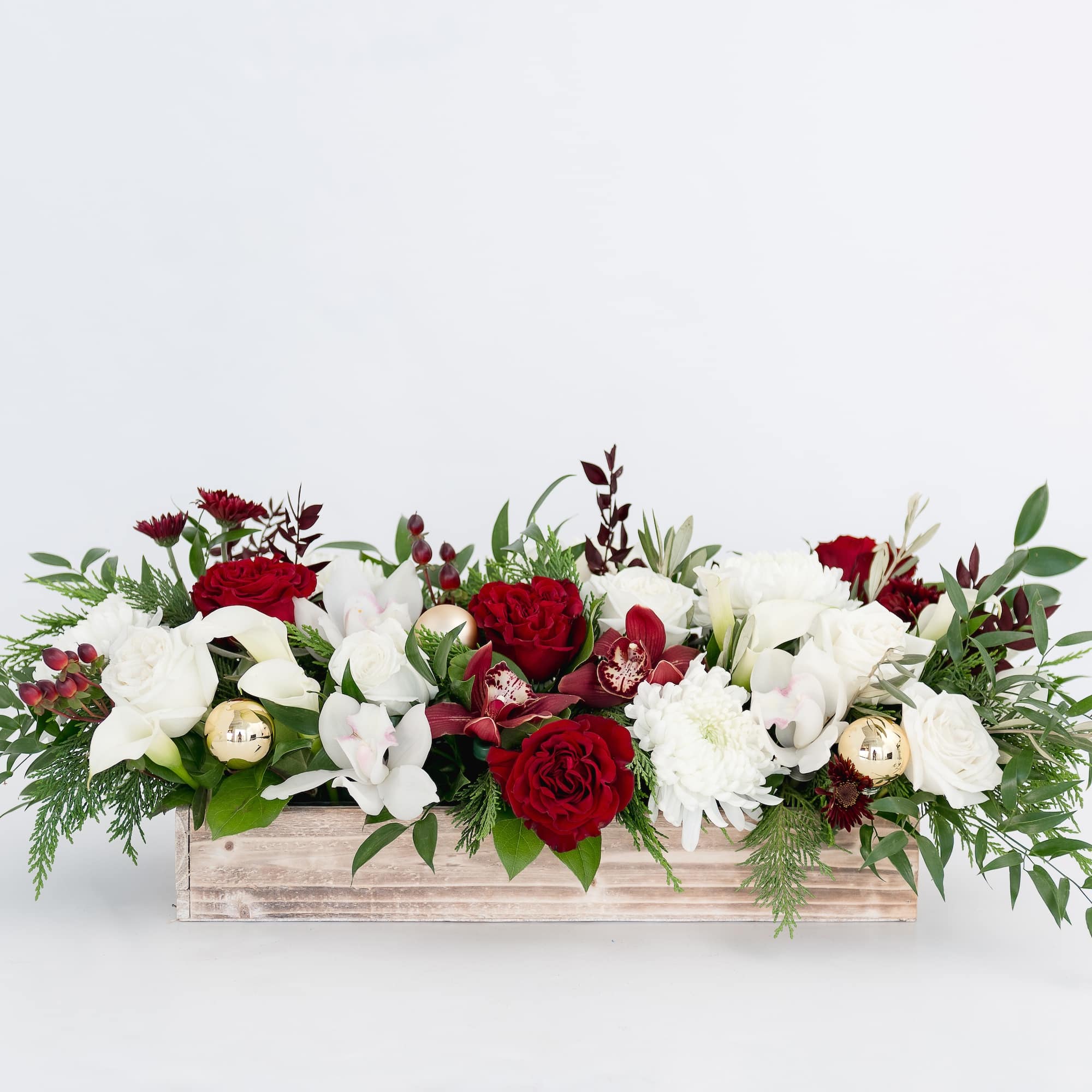 A long and showy &quot;WOW&quot; arrangement in deep reds and classic white