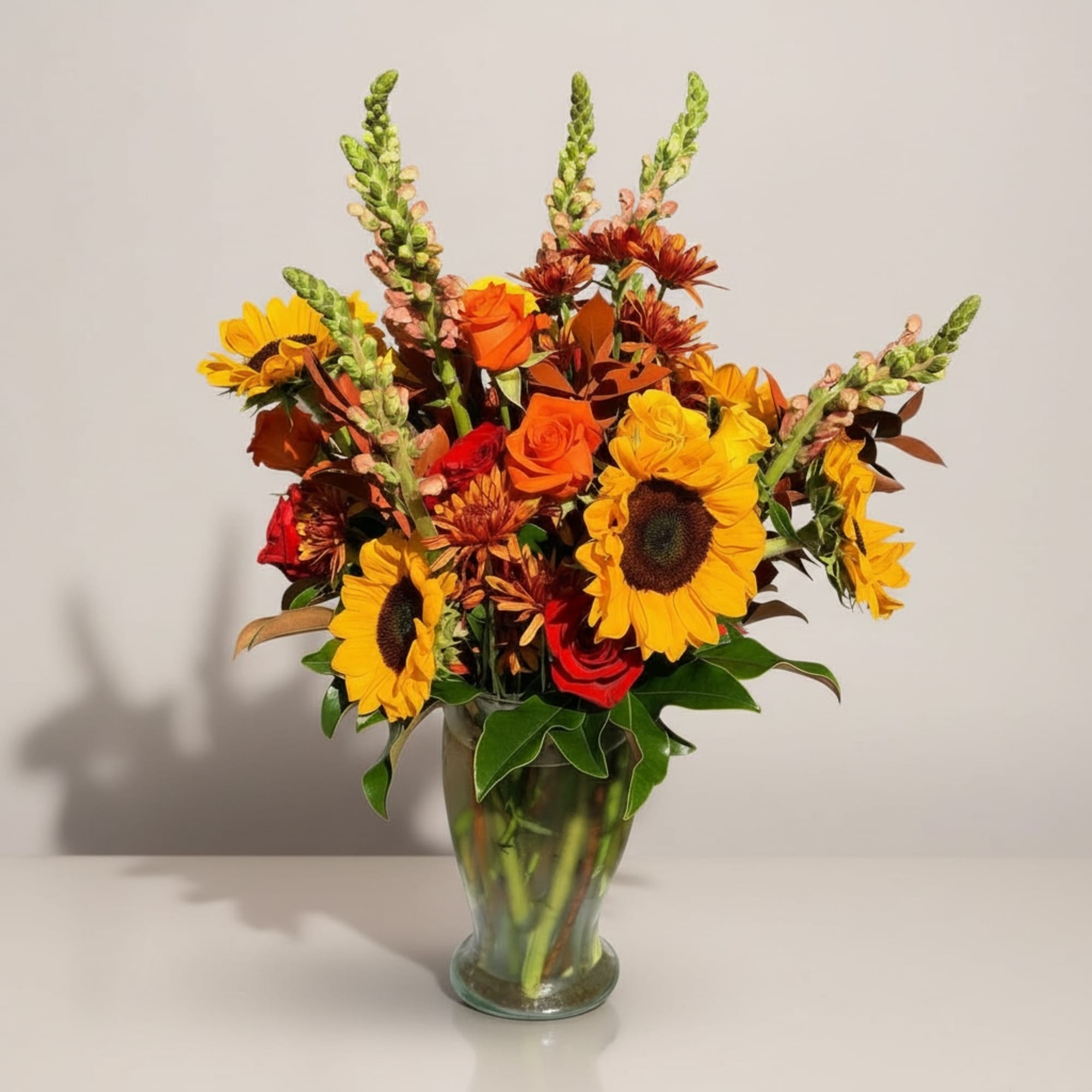 Say hello to the new season with this tower of fall flowers!