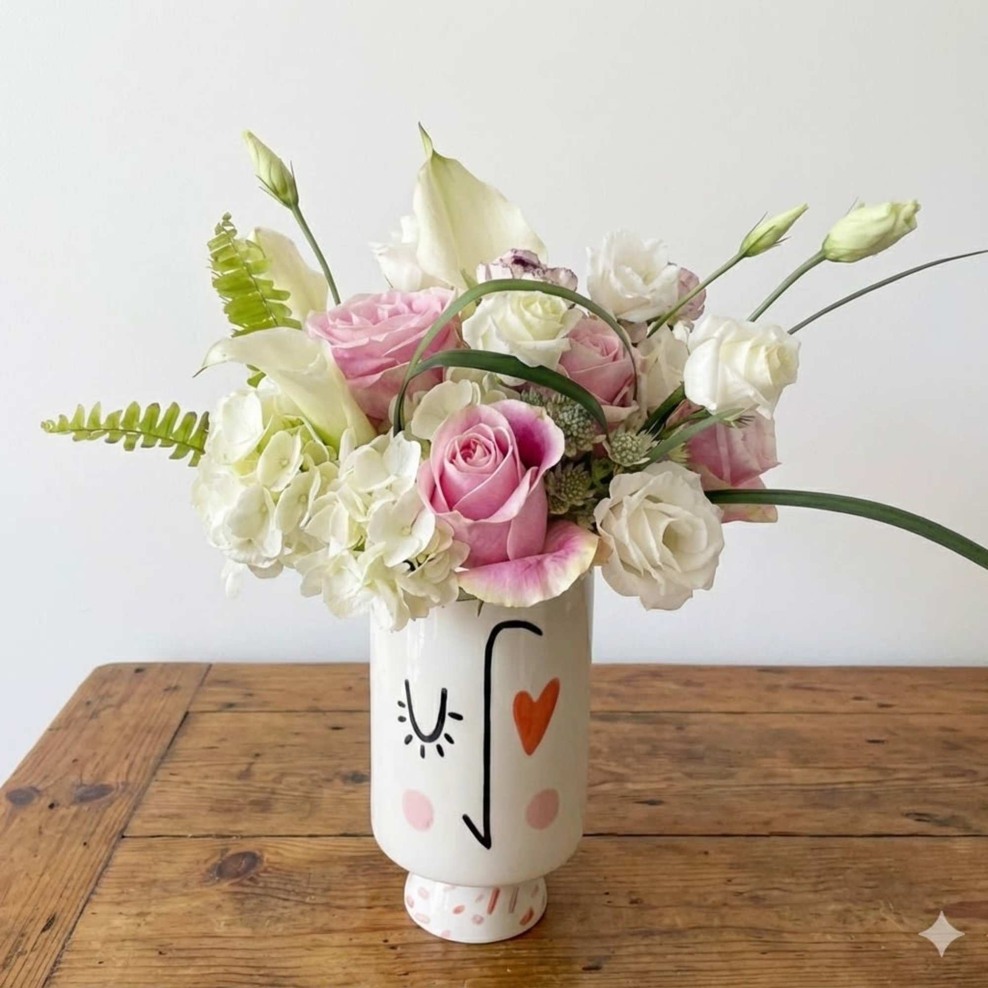 This is an elegant and fun floral design, inspired by its vessel