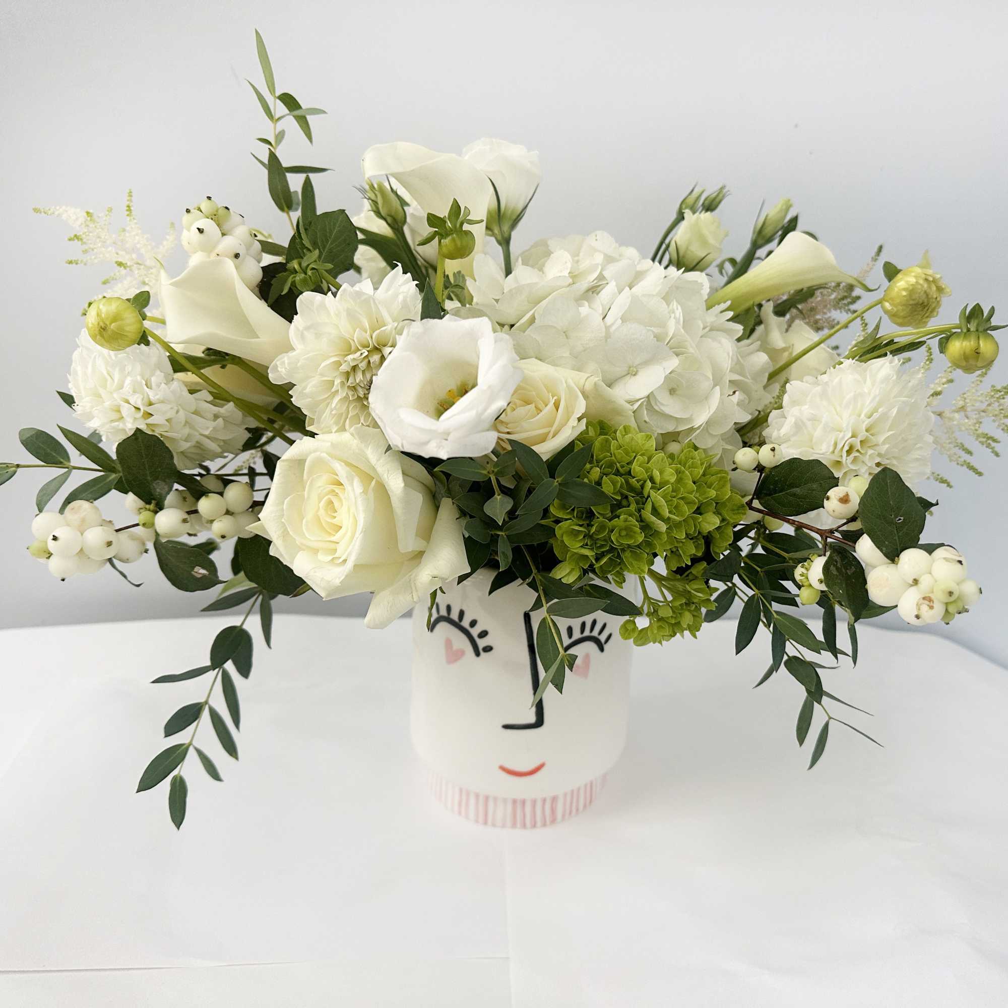 Bright, whimsical, and full of charm &mdash; Smiling White features a luxurious