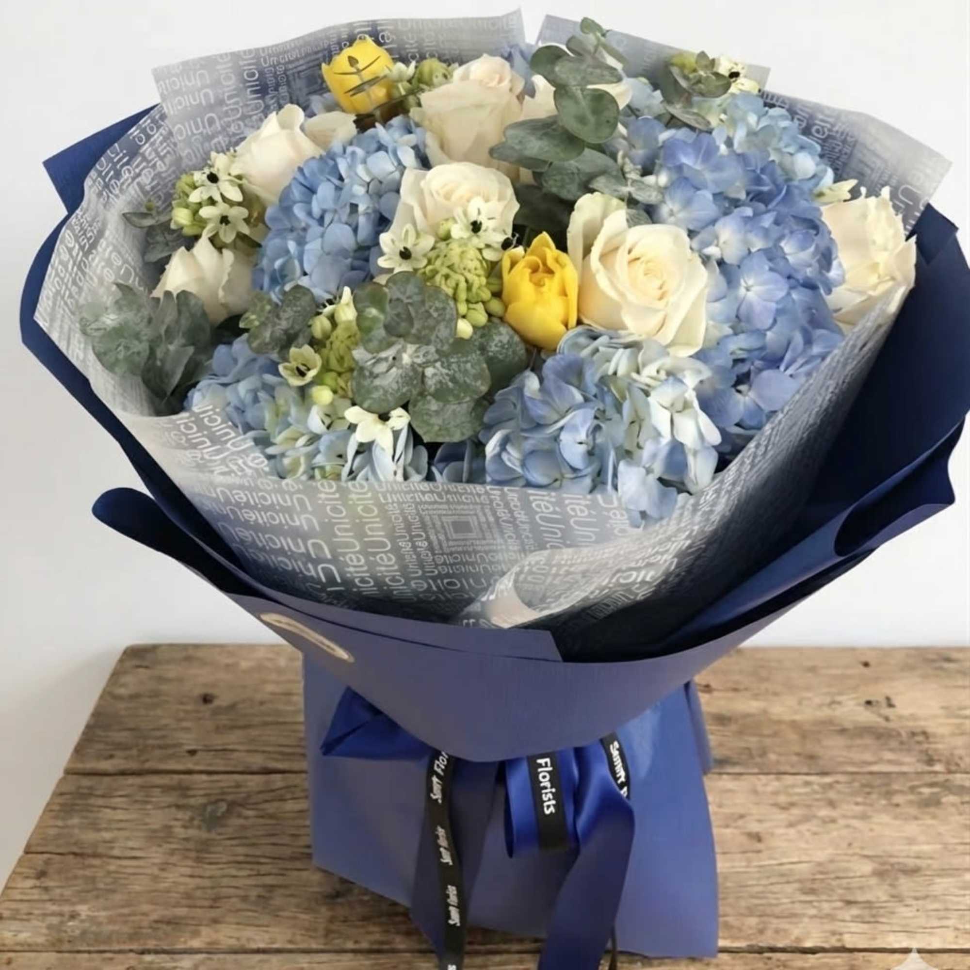 It's a simple but elegant display. The arrangement comes with ivory, soft