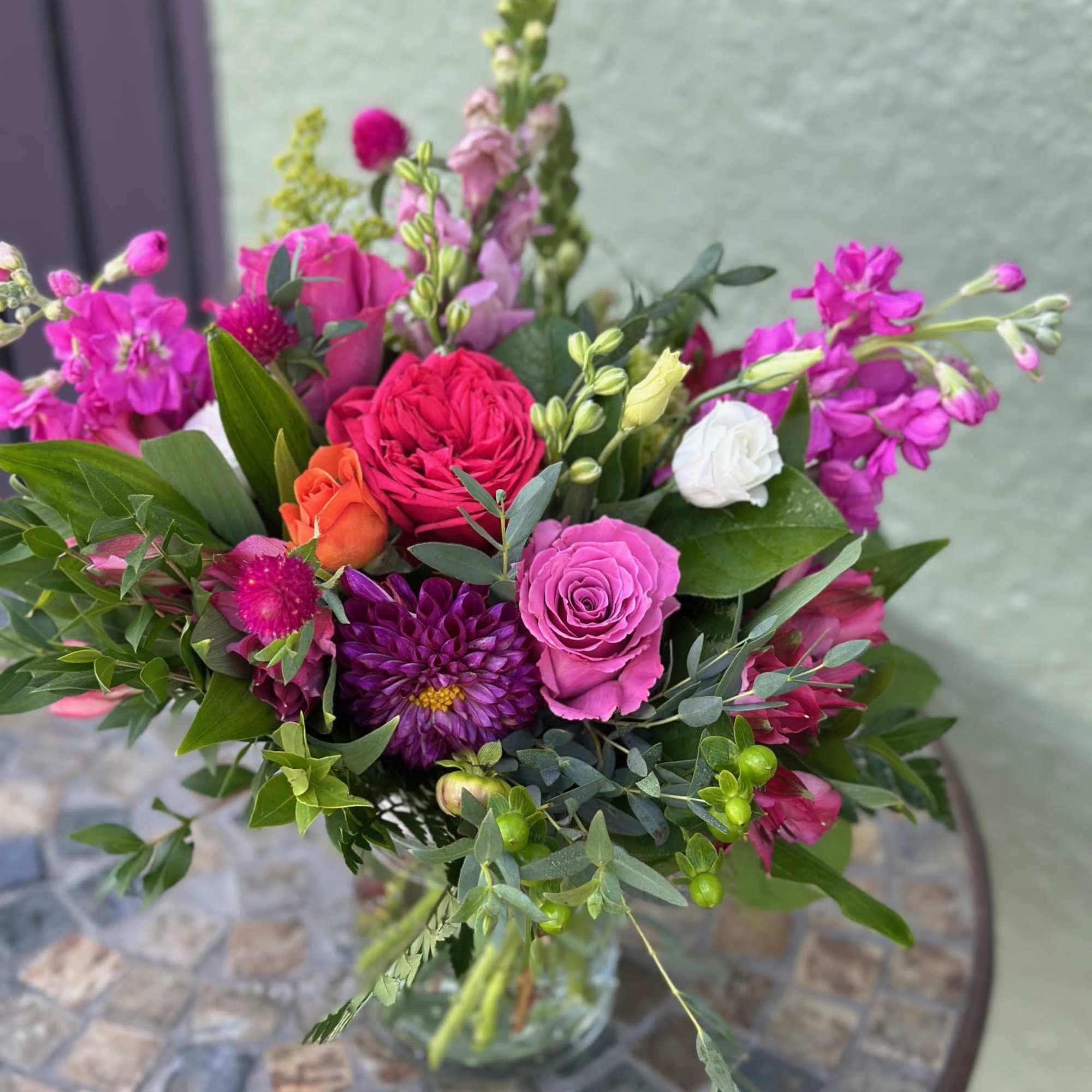 In honor and excitement of the Swift-Kelce engagement this arrangement is bursting