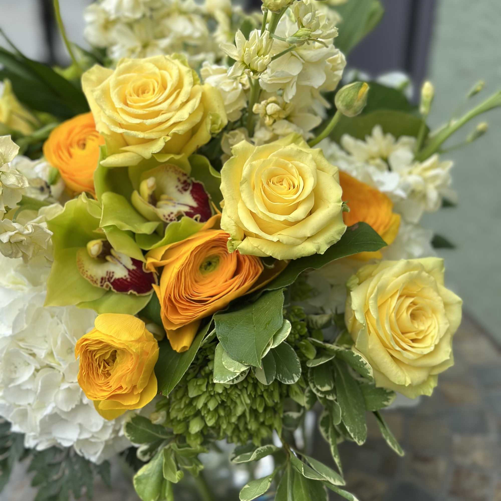 Bask in the warmth of Petals in the Sun, a radiant arrangement