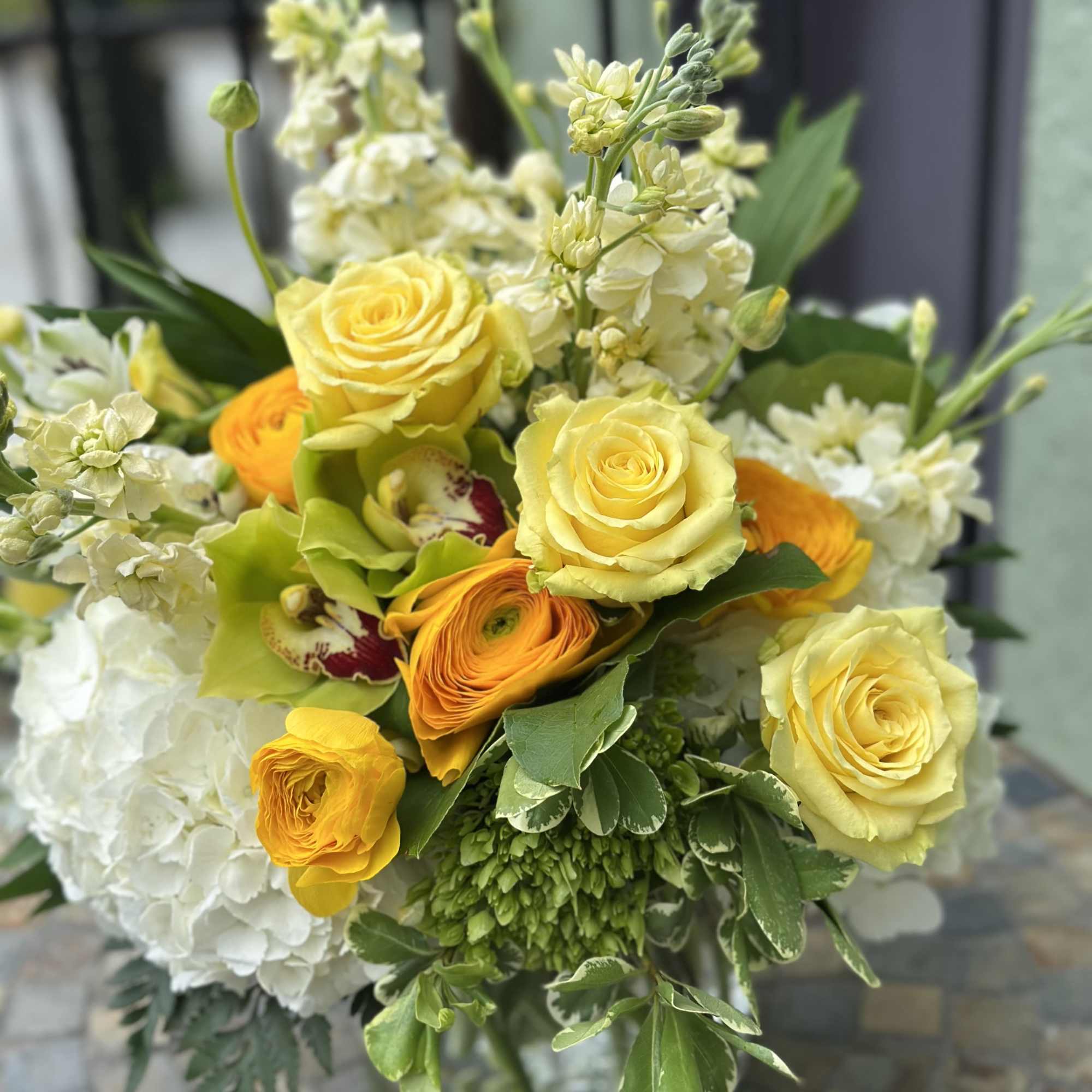 Bask in the warmth of Petals in the Sun, a radiant arrangement