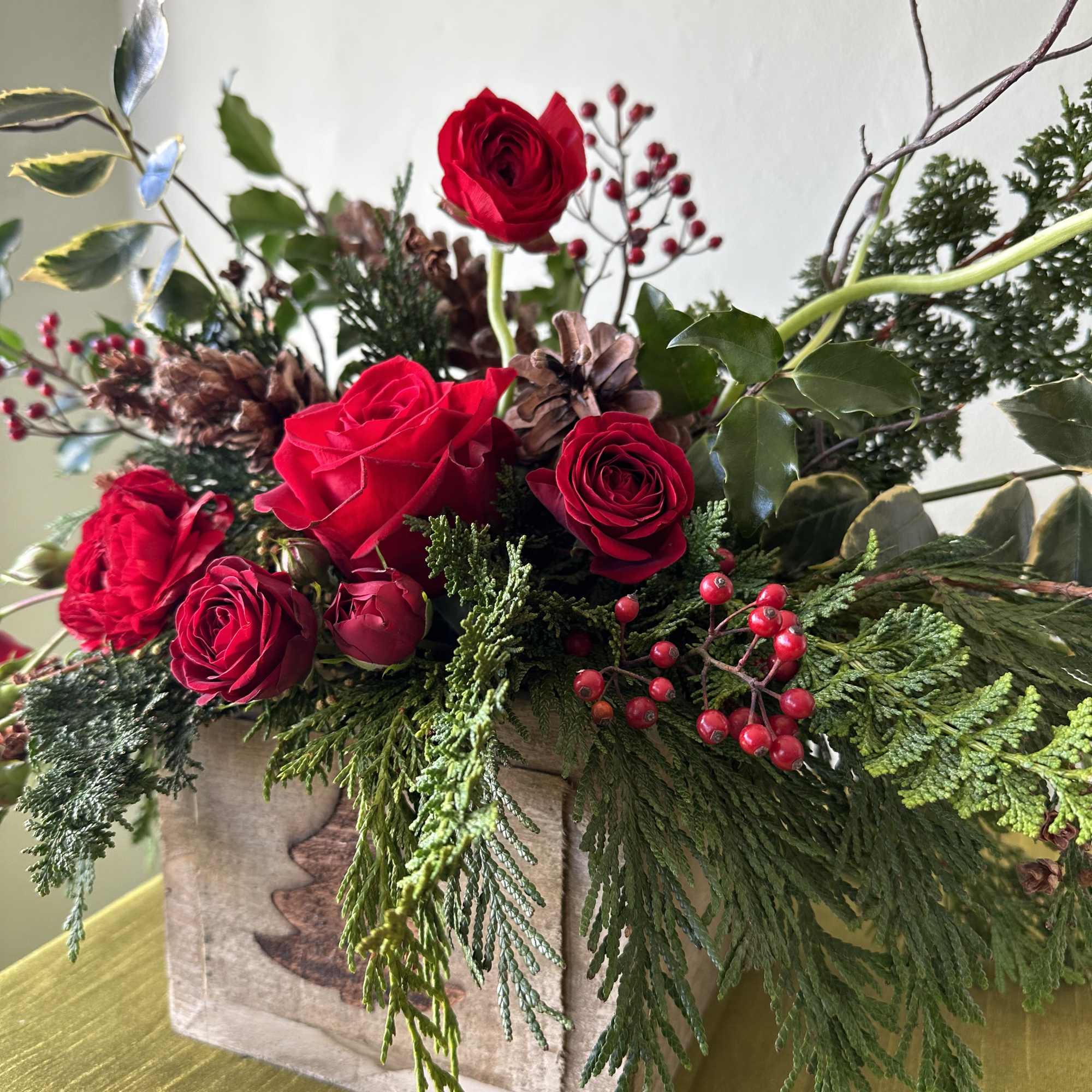 This arrangement is sure to bring seasonal holiday cheer to you or