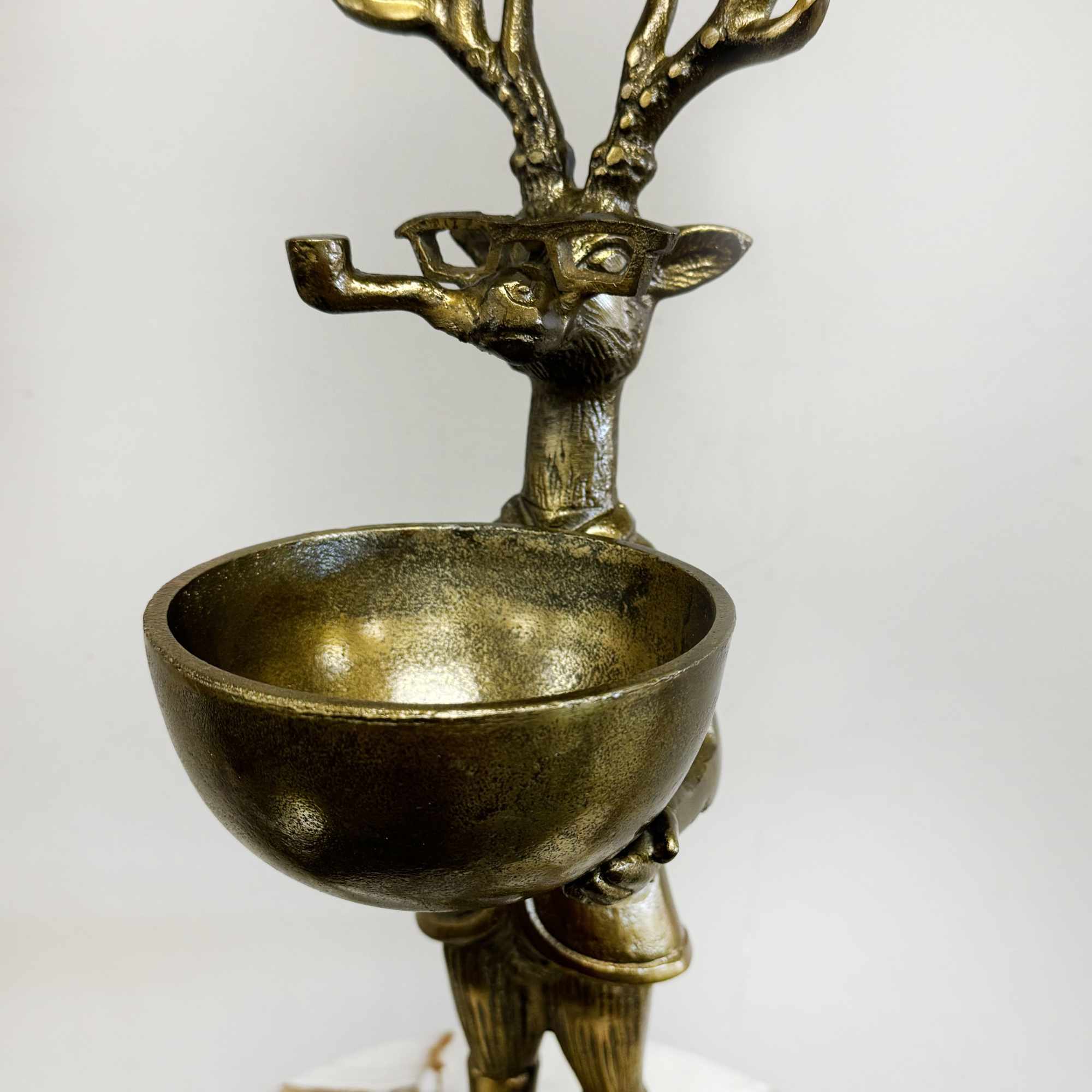 Showcased in a charming keepsake brass reindeer vase, this festive display features