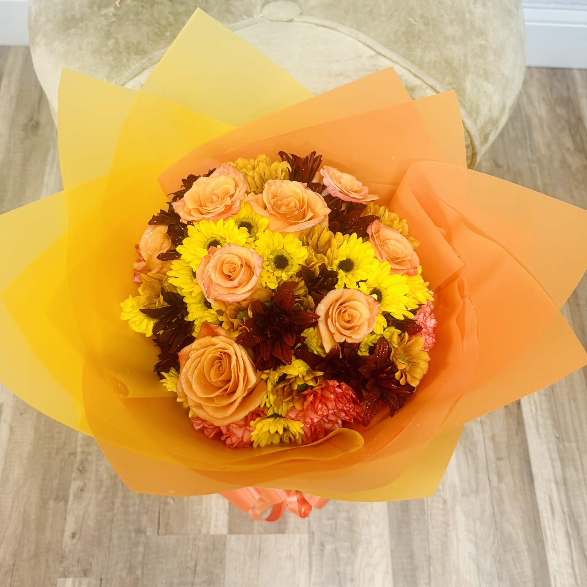 A warm autumn embrace in every petal. This bouquet celebrates gratitude with
