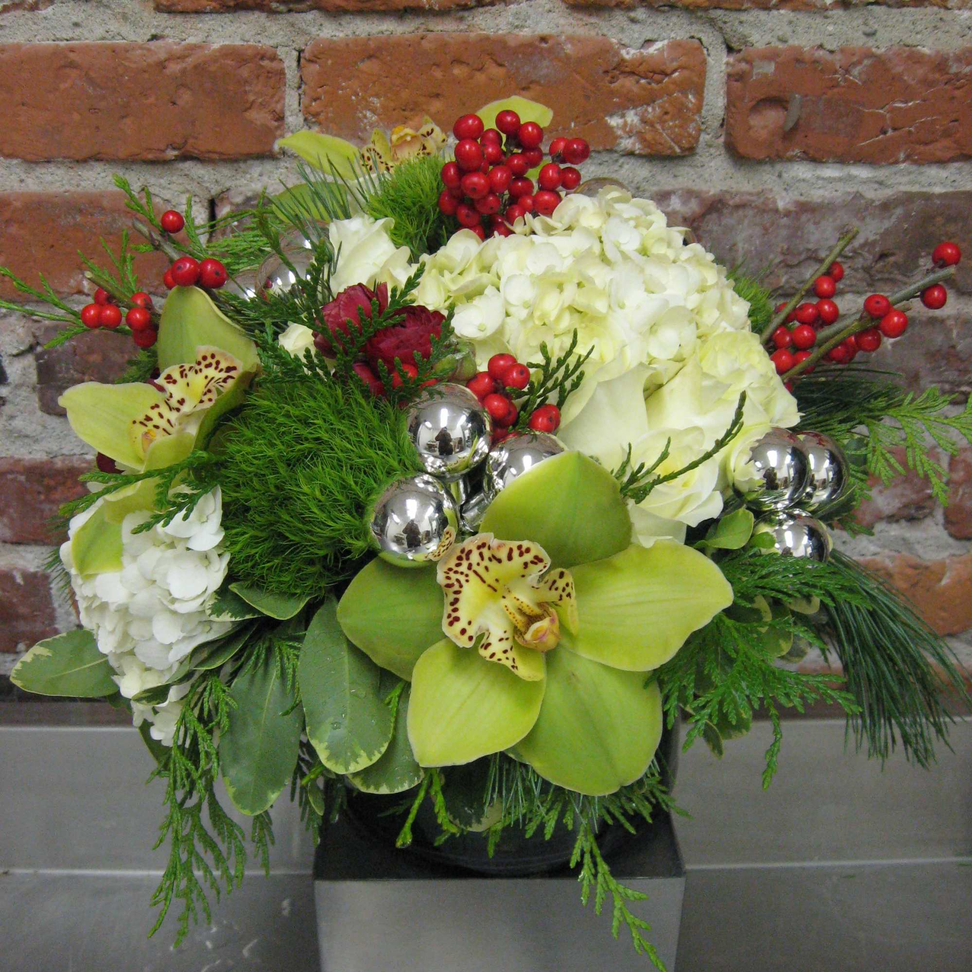 Available beginning December 3rd.

Merry and Bright is the perfect floral arrangement to