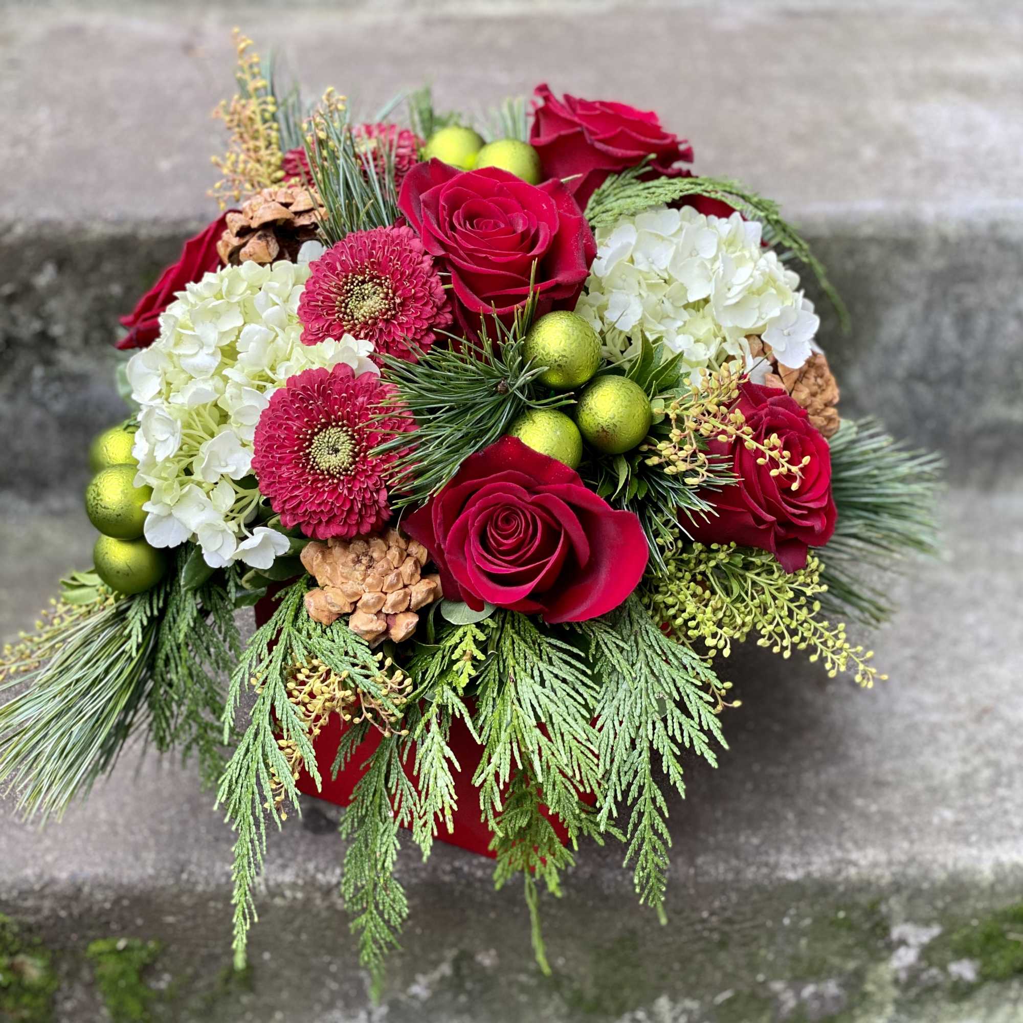 Available beginning December 3rd.

Merry and Bright is the perfect floral arrangement to