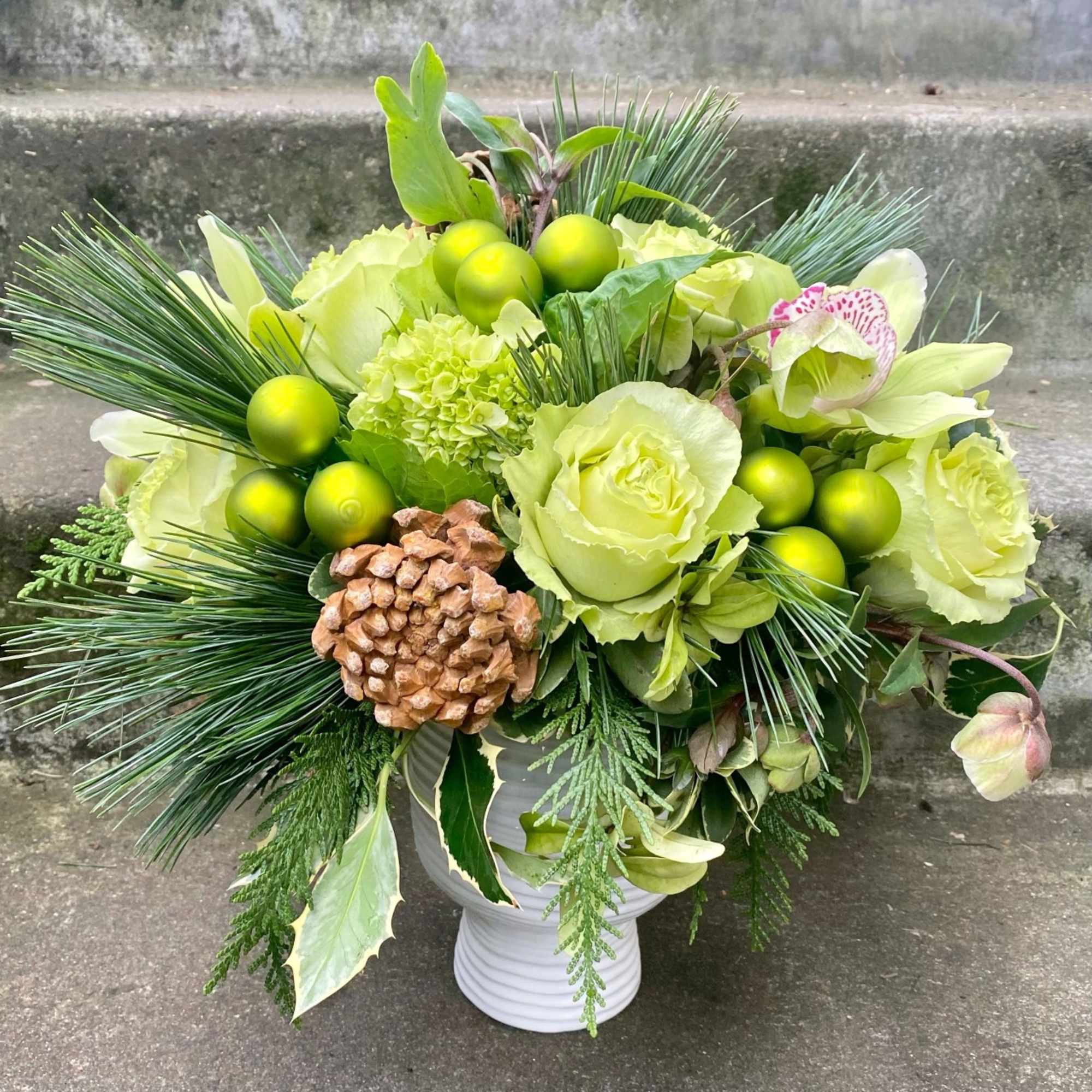 Available beginning December 3rd.

Merry and Bright is the perfect floral arrangement to