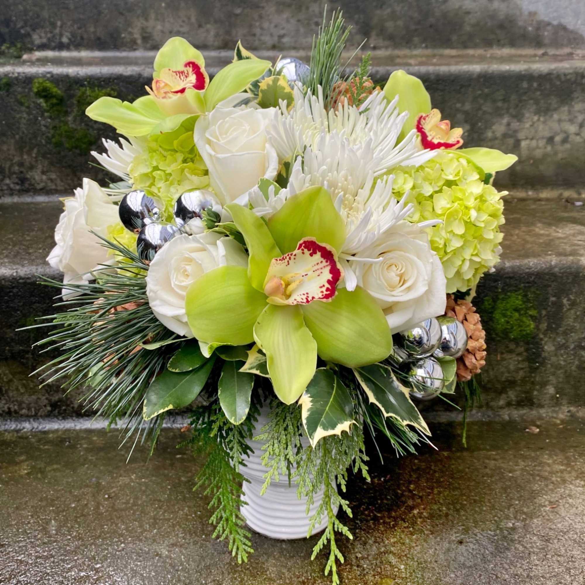 Available beginning December 3rd.

Merry and Bright is the perfect floral arrangement to