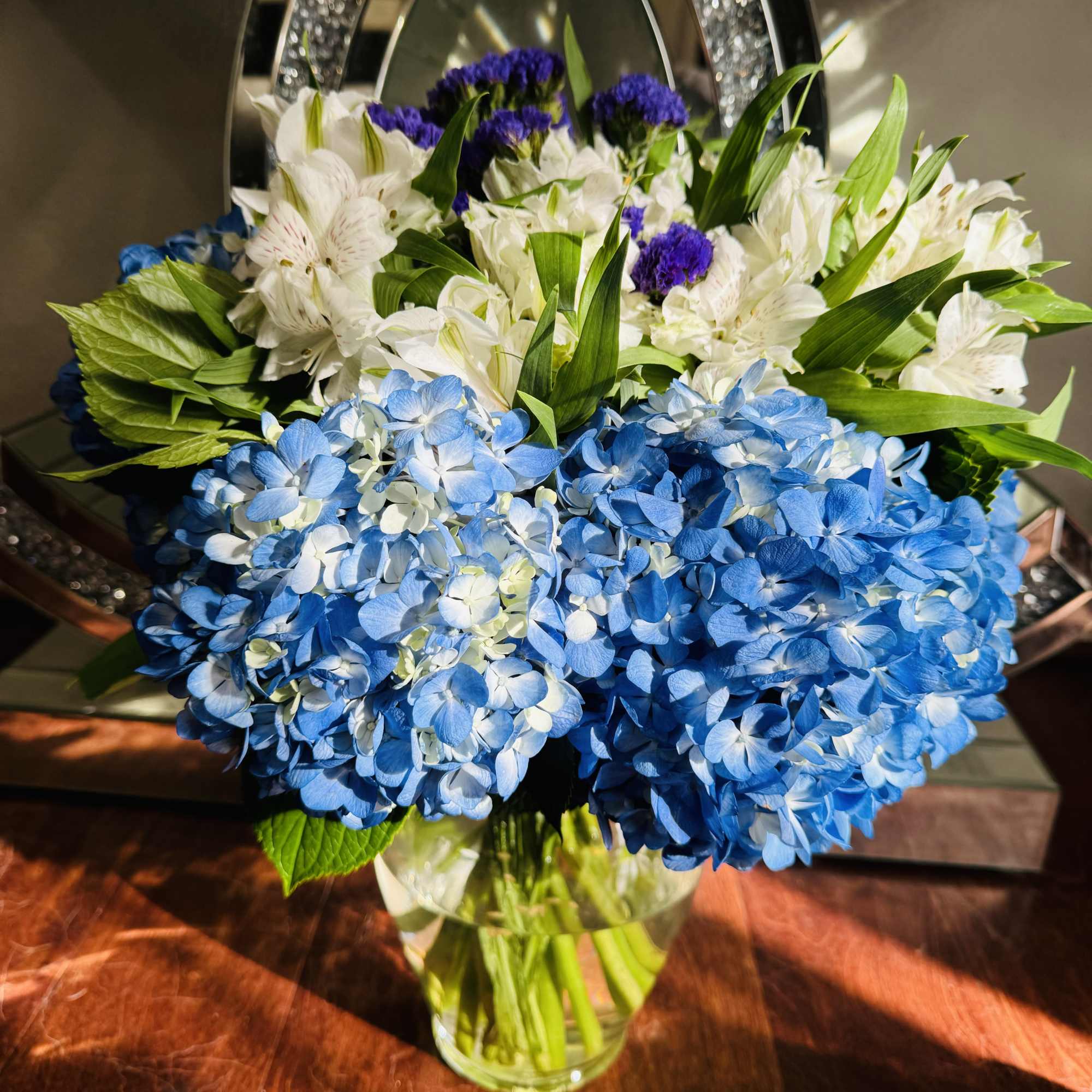 White Asters with blue Hydrangeas are one of the best choice for