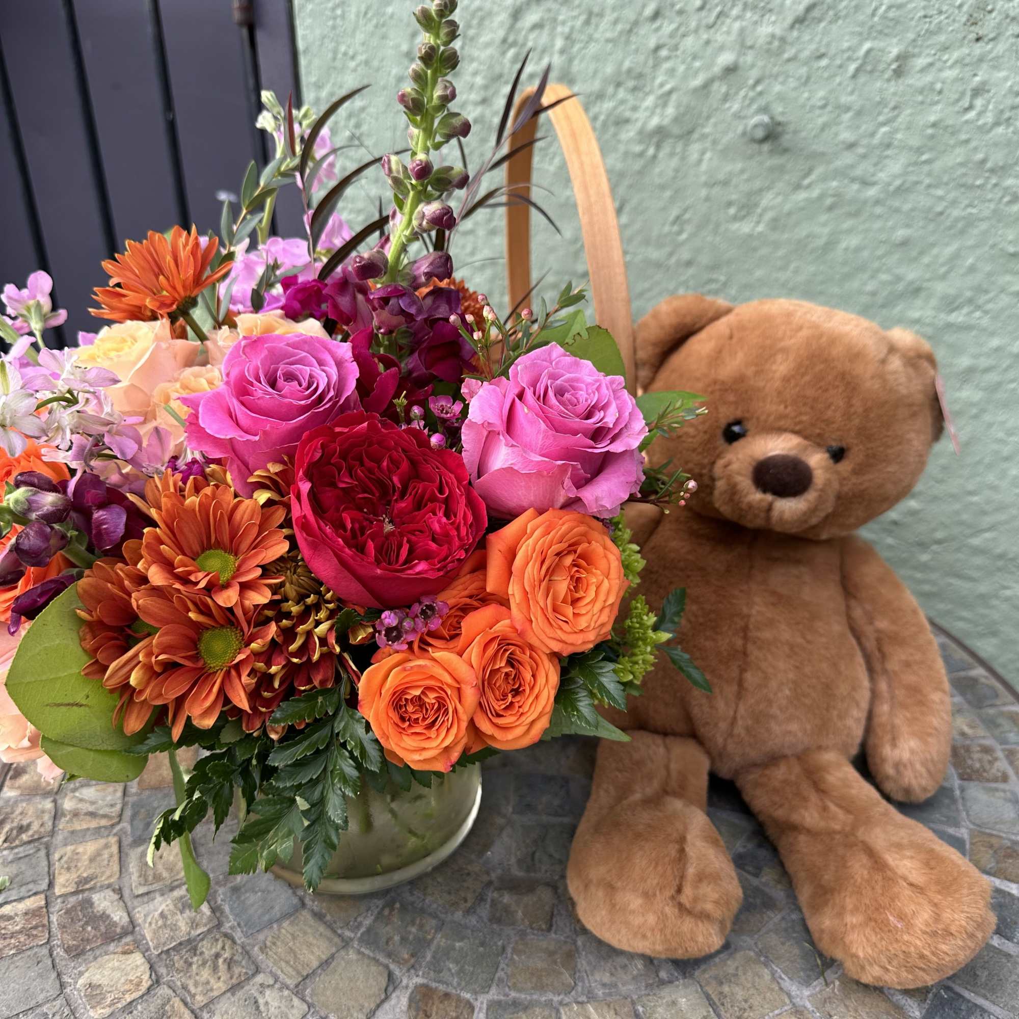 Lovely duet of beautiful floral arrangement and a super soft bear in