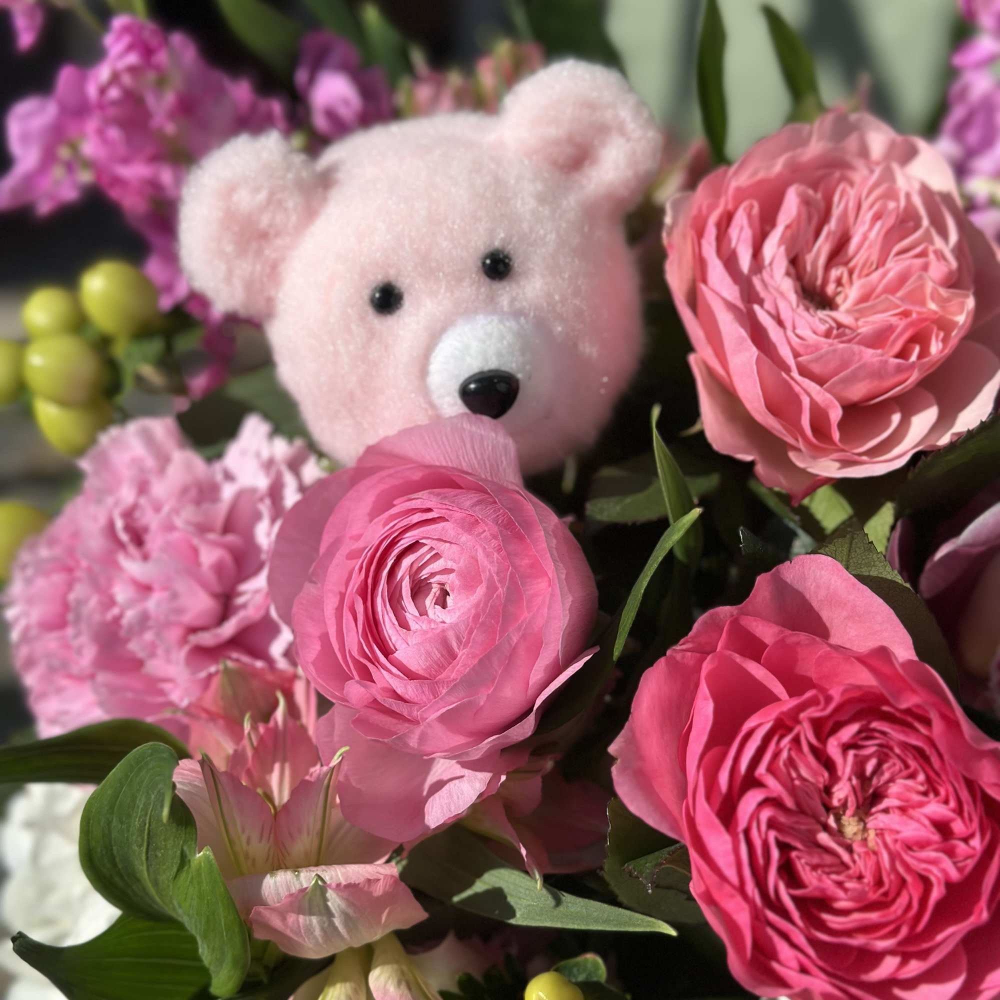 Ellie is a bright and playful mix of garden roses, dahlias, ranunculus