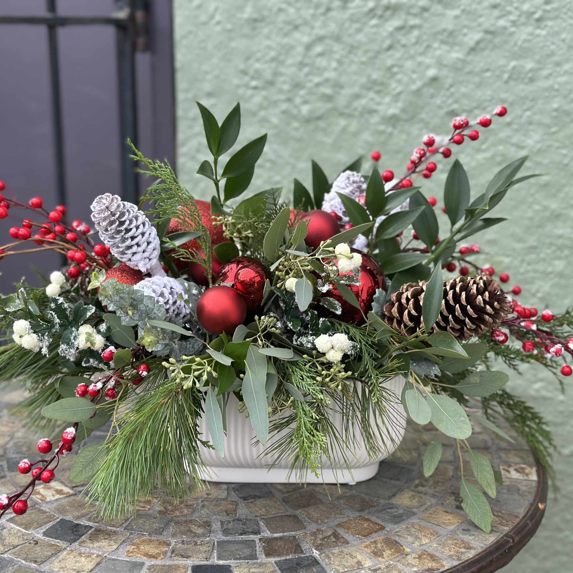 Bring holiday magic to home! This low profile centerpiece is designed in