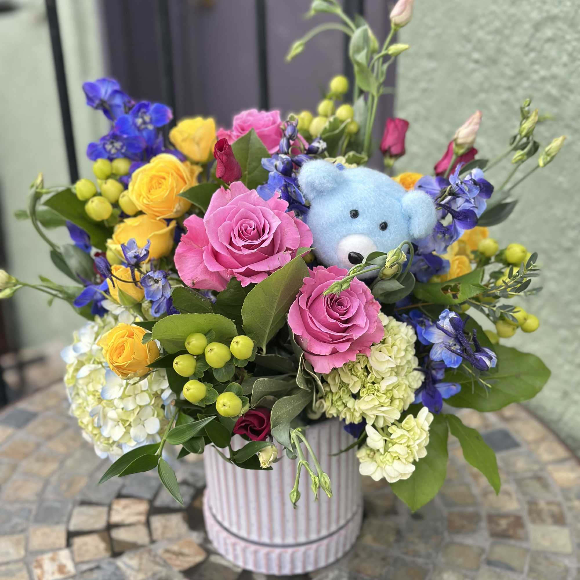 Welcome the precious new arrival, &quot;Oliver&quot;, with this vibrant and playful arrangement.