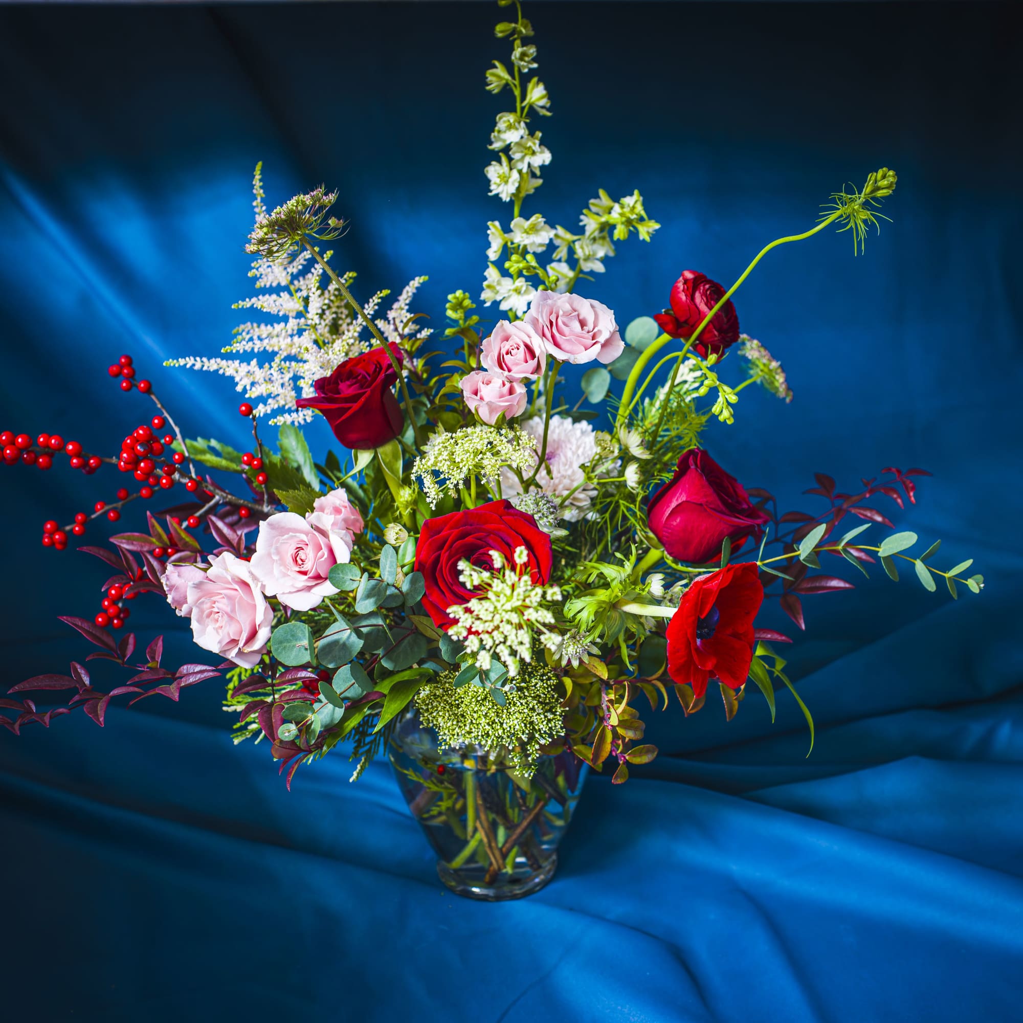 A traditional palette of reds, whites and pinks with seasonal greens is