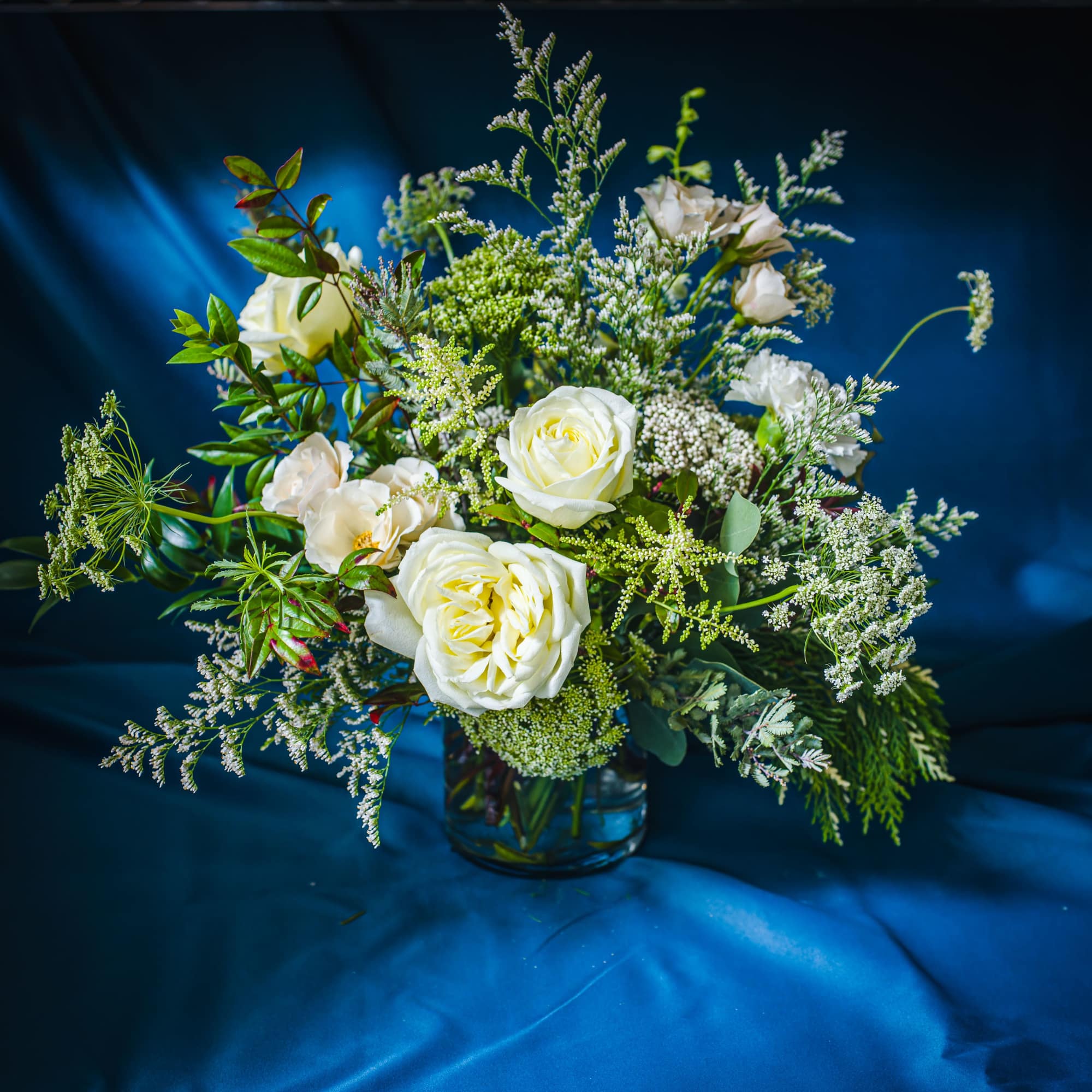 Layers of winter white and textural greens for a sophisticated, neutral palette.