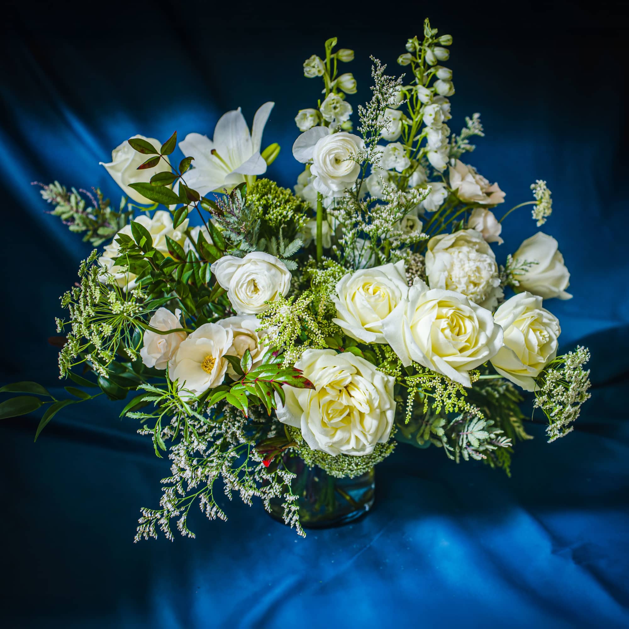 Layers of winter white and textural greens for a sophisticated, neutral palette.