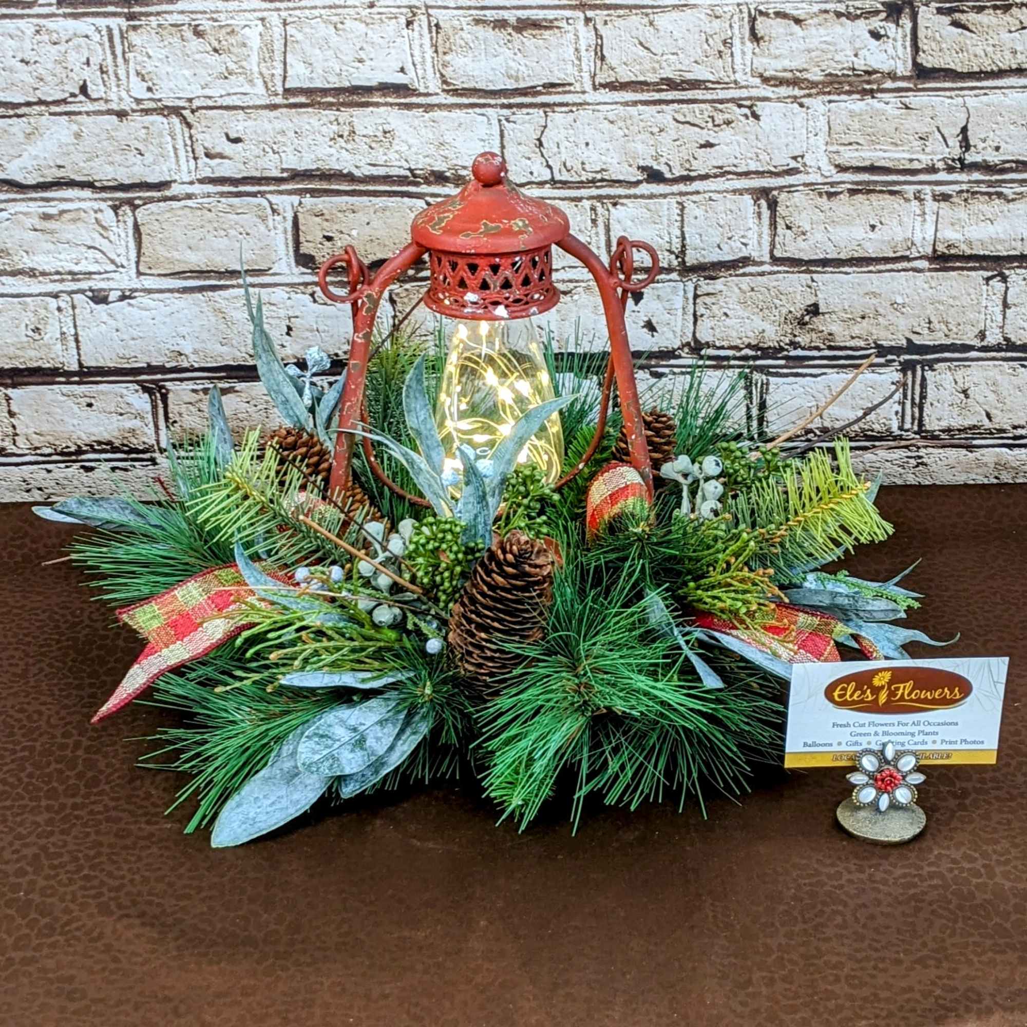 The Rustic Glow Lantern combines timeless charm with cozy holiday warmth. Featuring