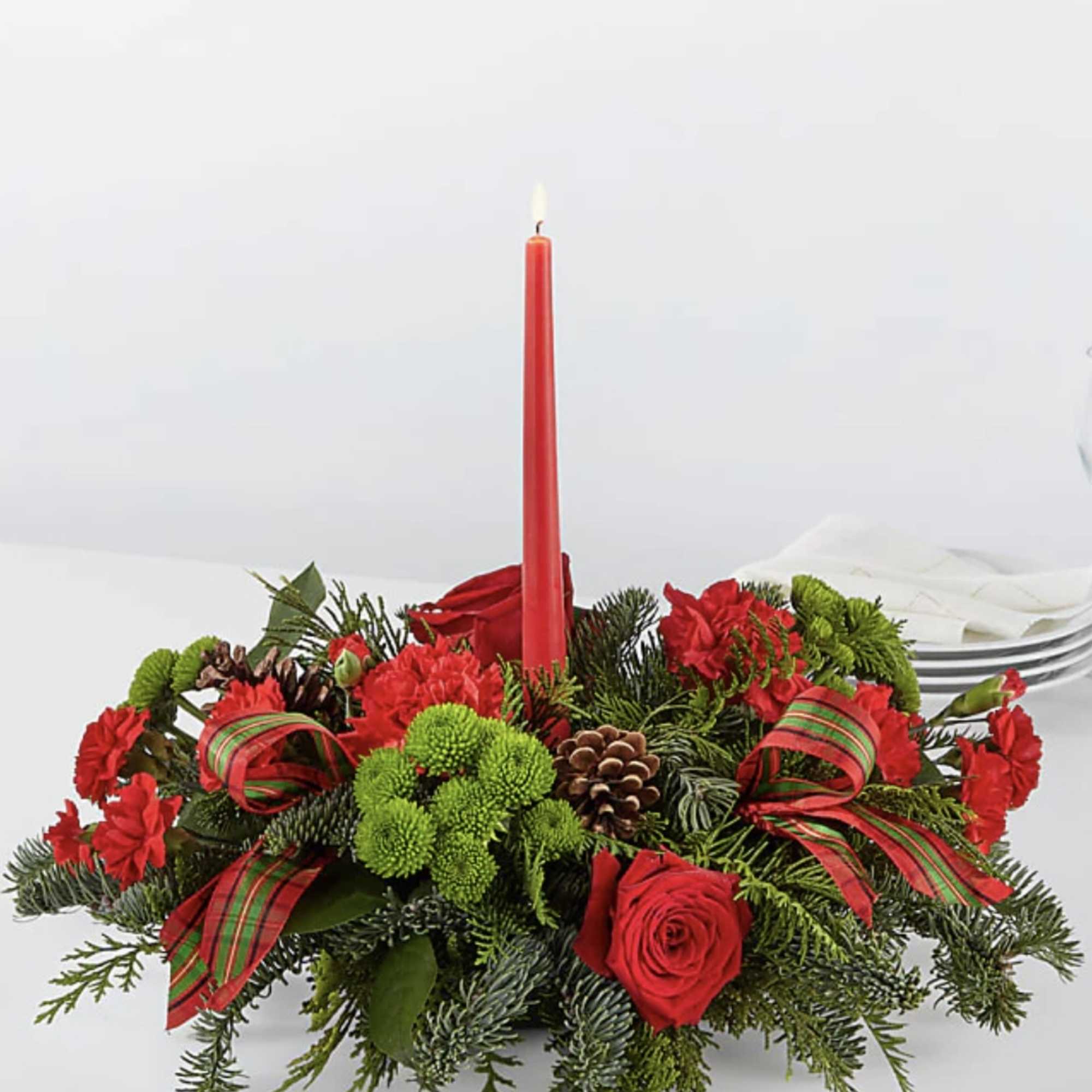 Let time fly By the Candlelight centerpiece as new holiday memories are