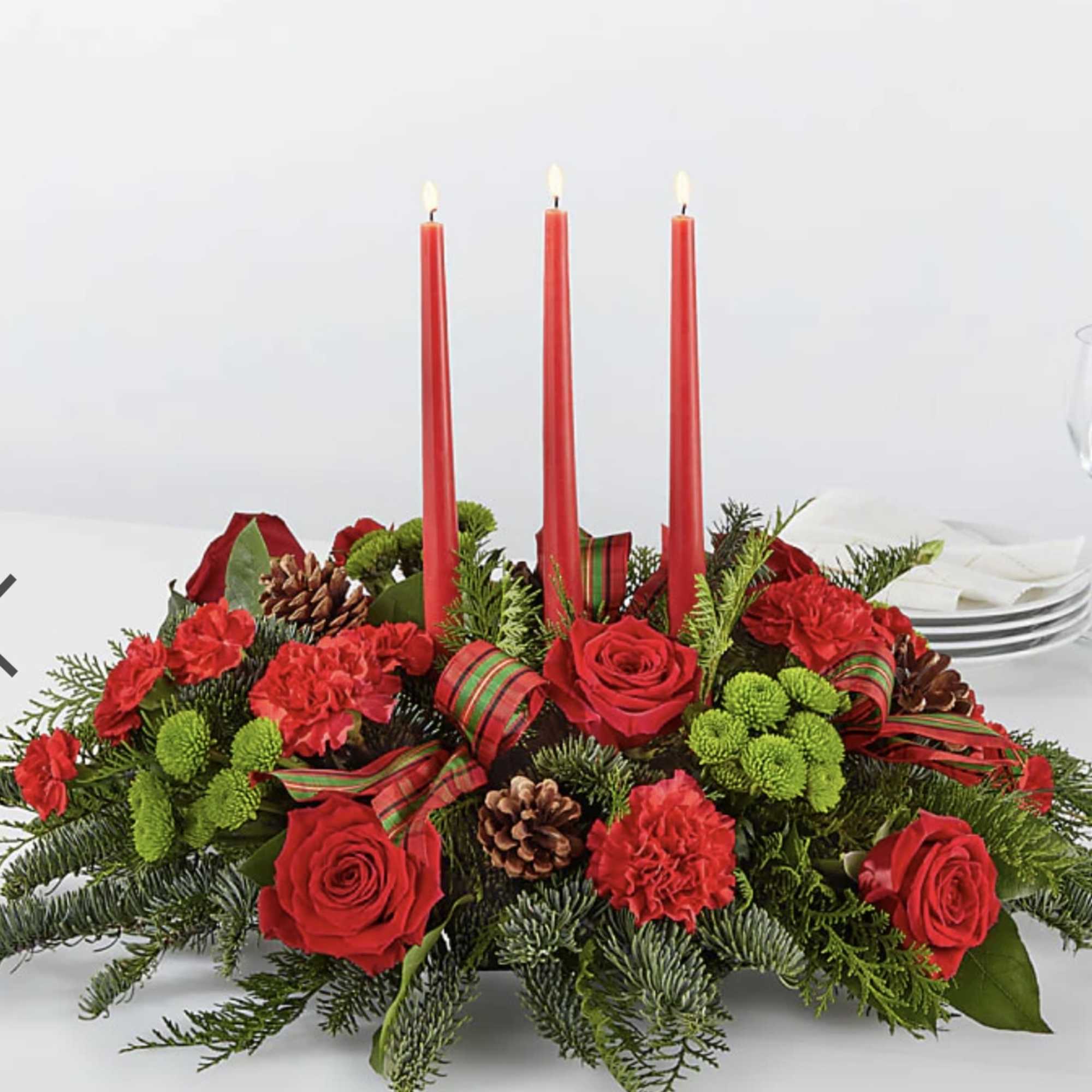 Let time fly By the Candlelight centerpiece as new holiday memories are
