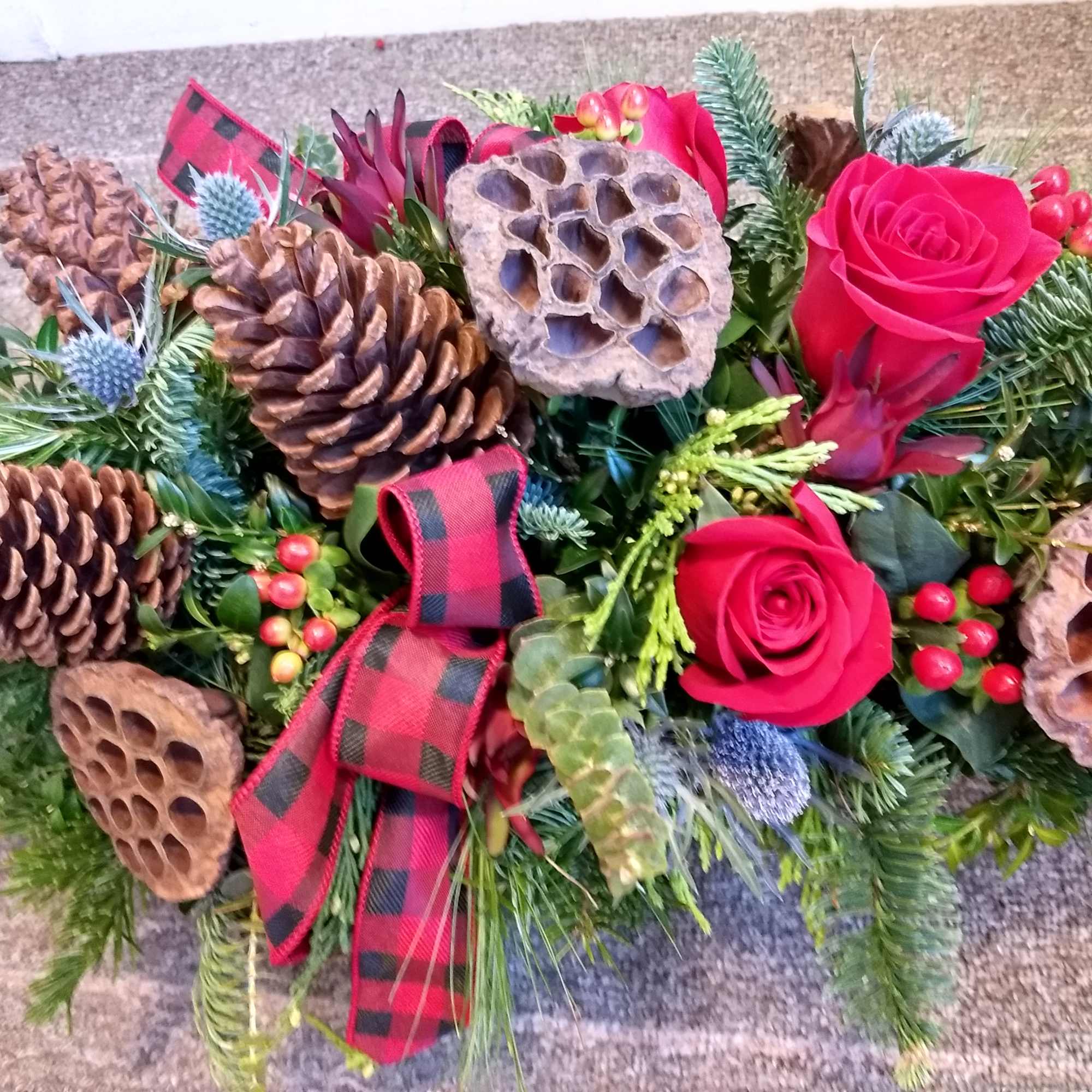 This stunning bouquet is handcrafted to bring the cozy rustic feel of