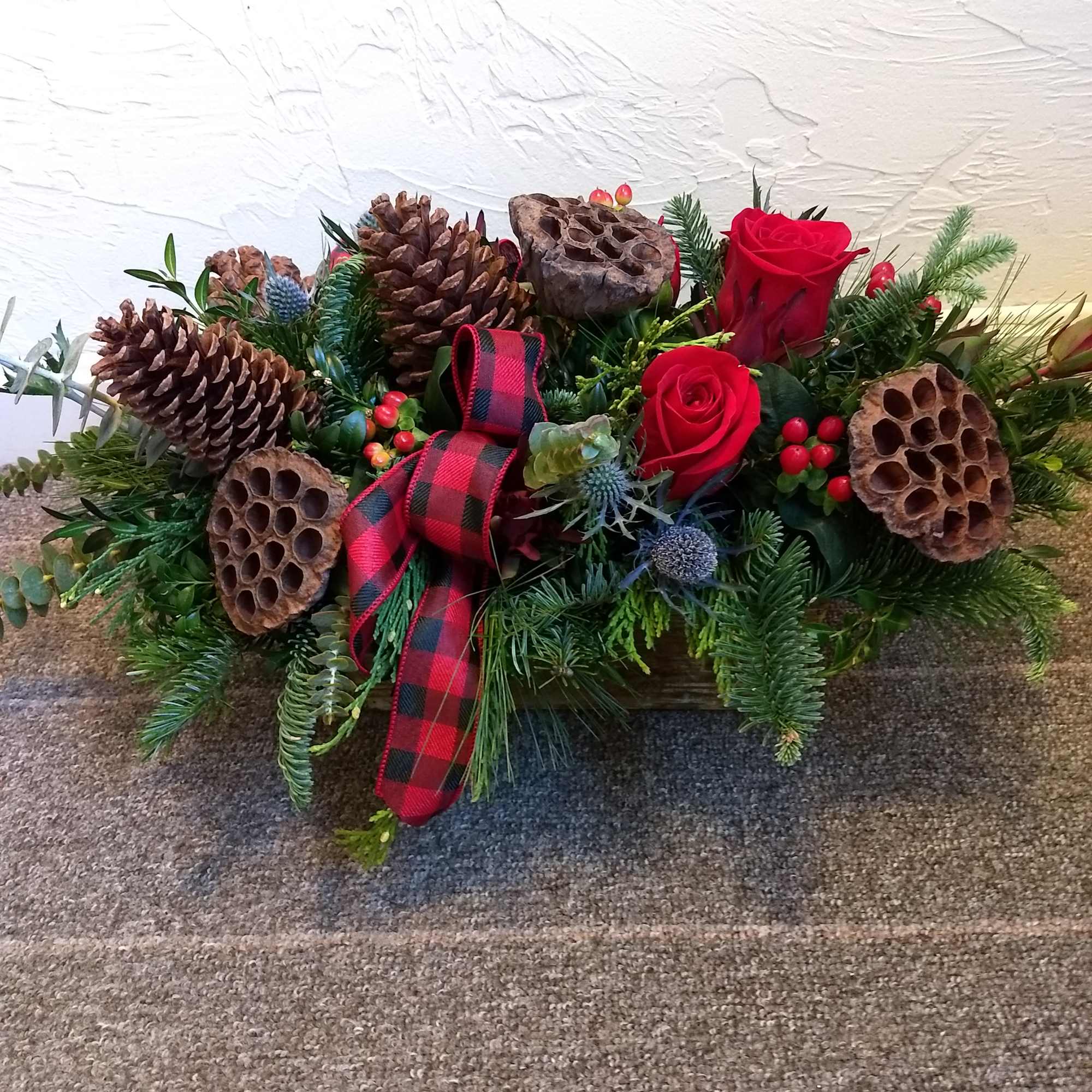 This stunning bouquet is handcrafted to bring the cozy rustic feel of