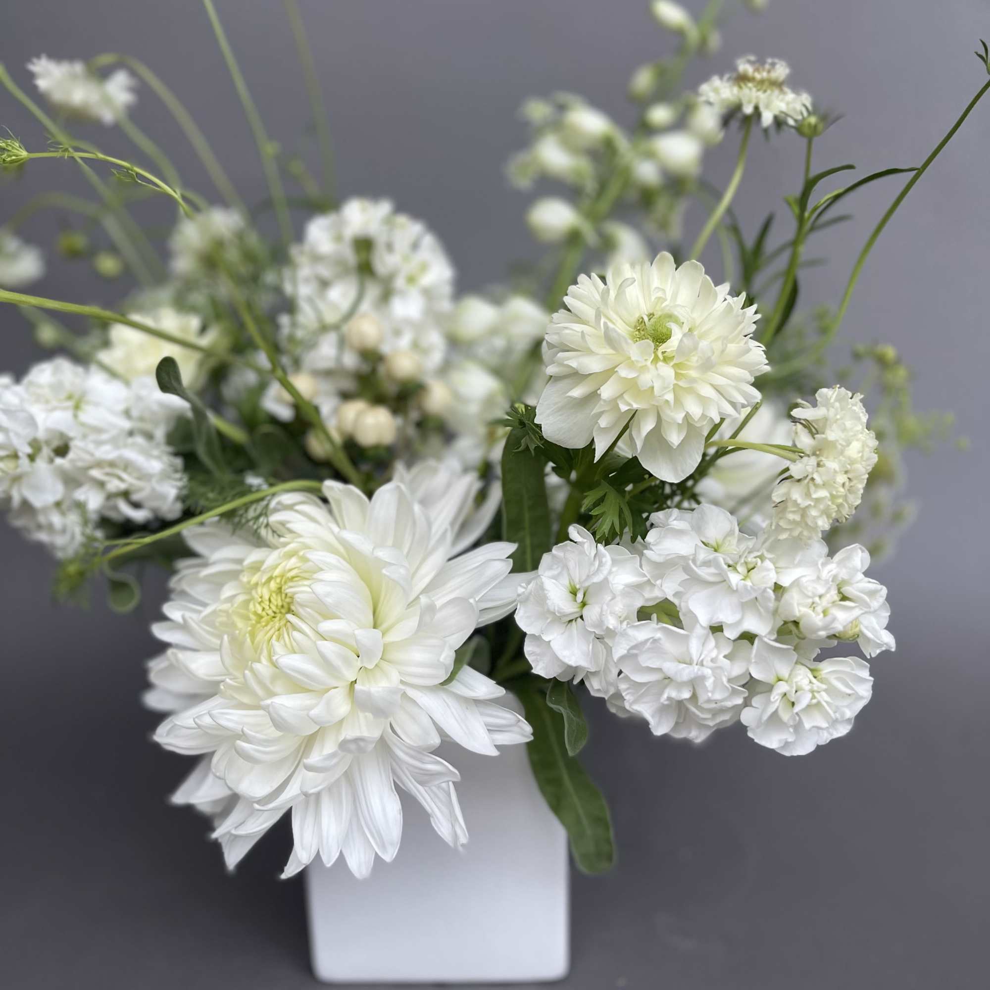 An all white lovely modern wild flower design. 