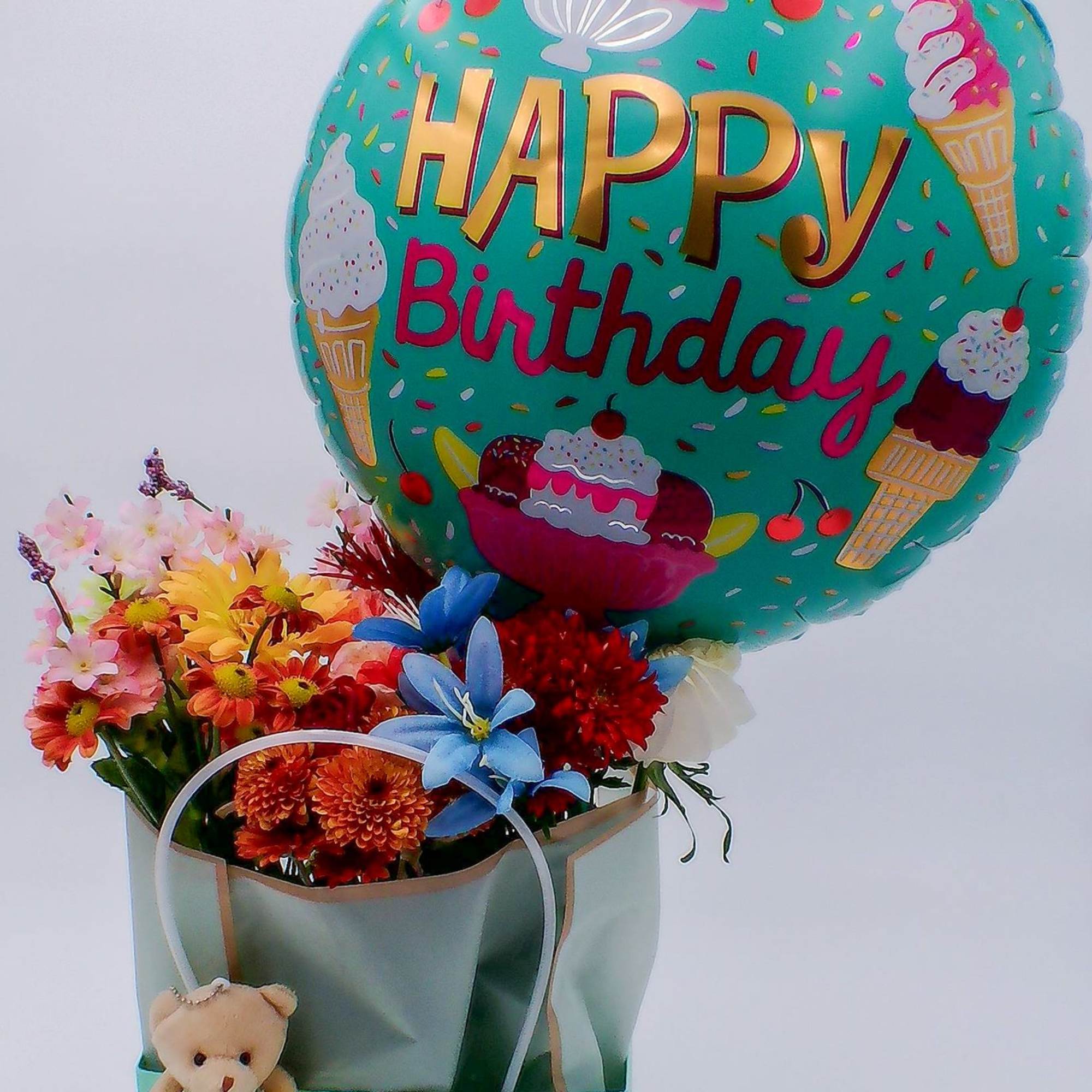 Mixed Fresh Flowers (12&ndash;14 stems): a colorful blend of 6 carnations, 