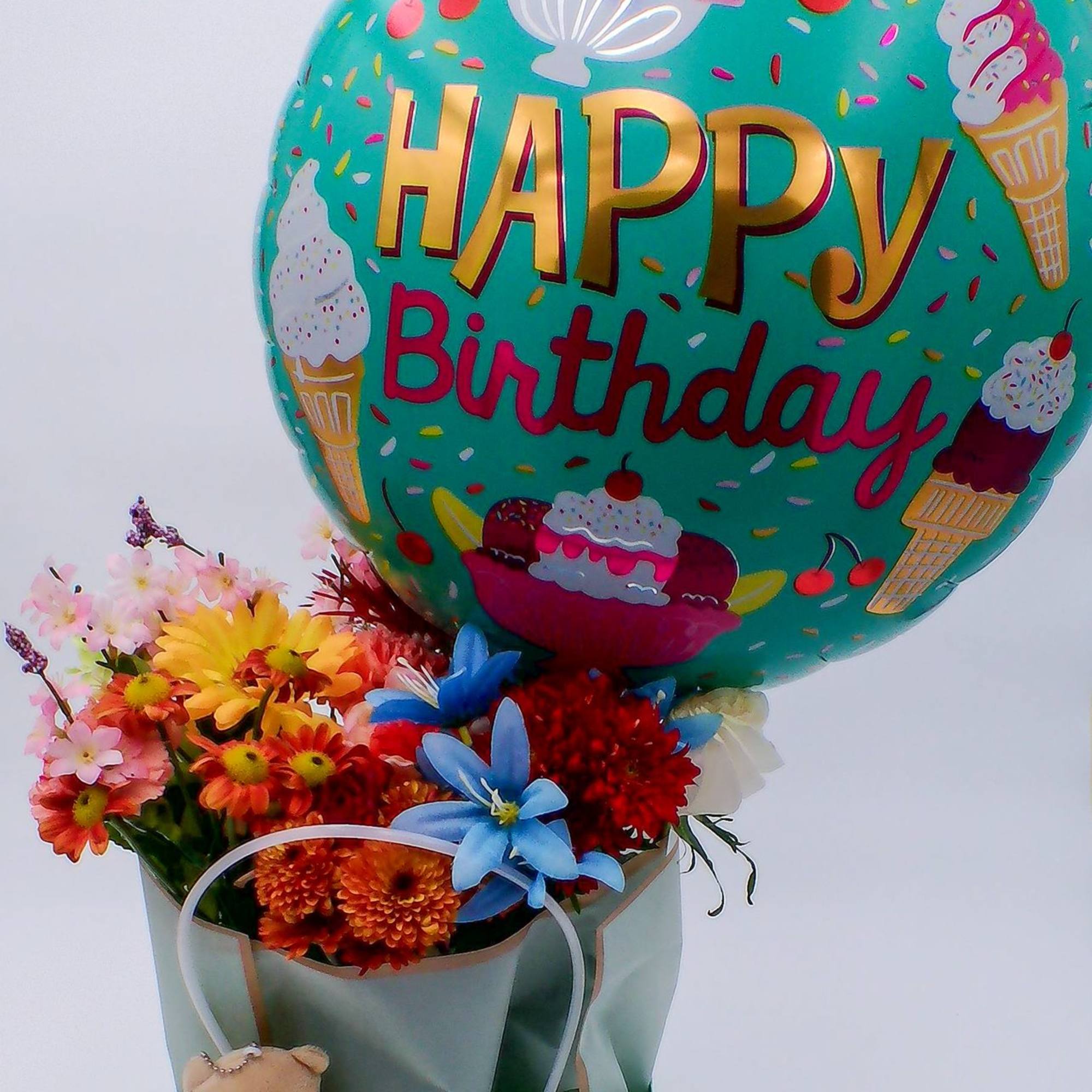 Mixed Fresh Flowers (12&ndash;14 stems): a colorful blend of 6 carnations, 