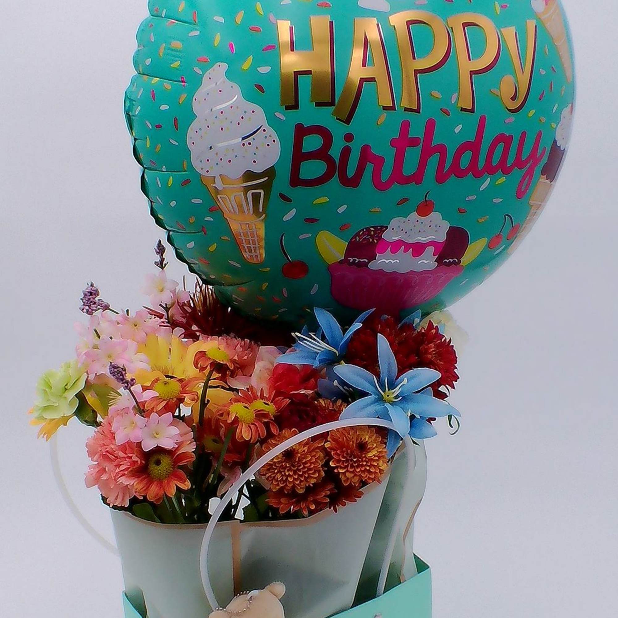 Mixed Fresh Flowers (12&ndash;14 stems): a colorful blend of 6 carnations, 