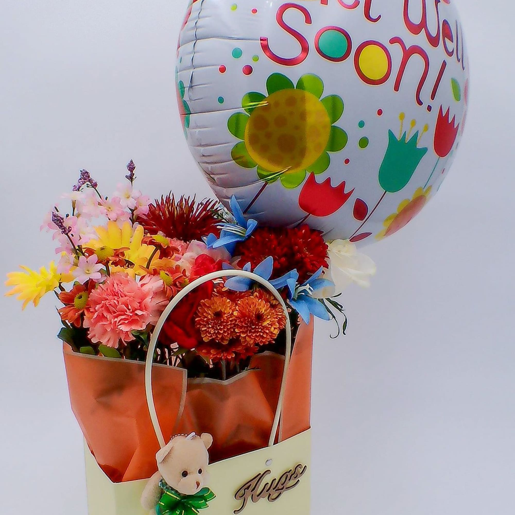 Mixed Fresh Flowers (14&ndash;16 stems): a colorful blend of 8 carnations, 2