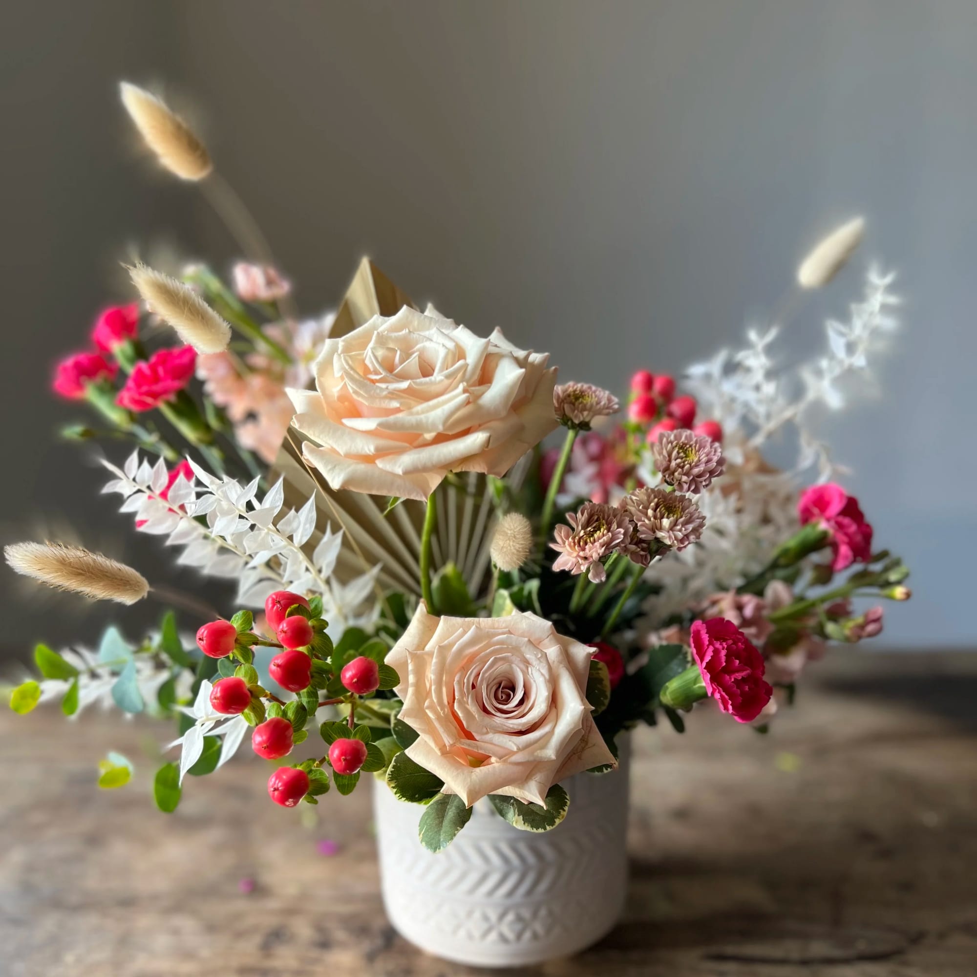 This arrangement is sweet and contemporary and perfect for any occasion. Welcome
