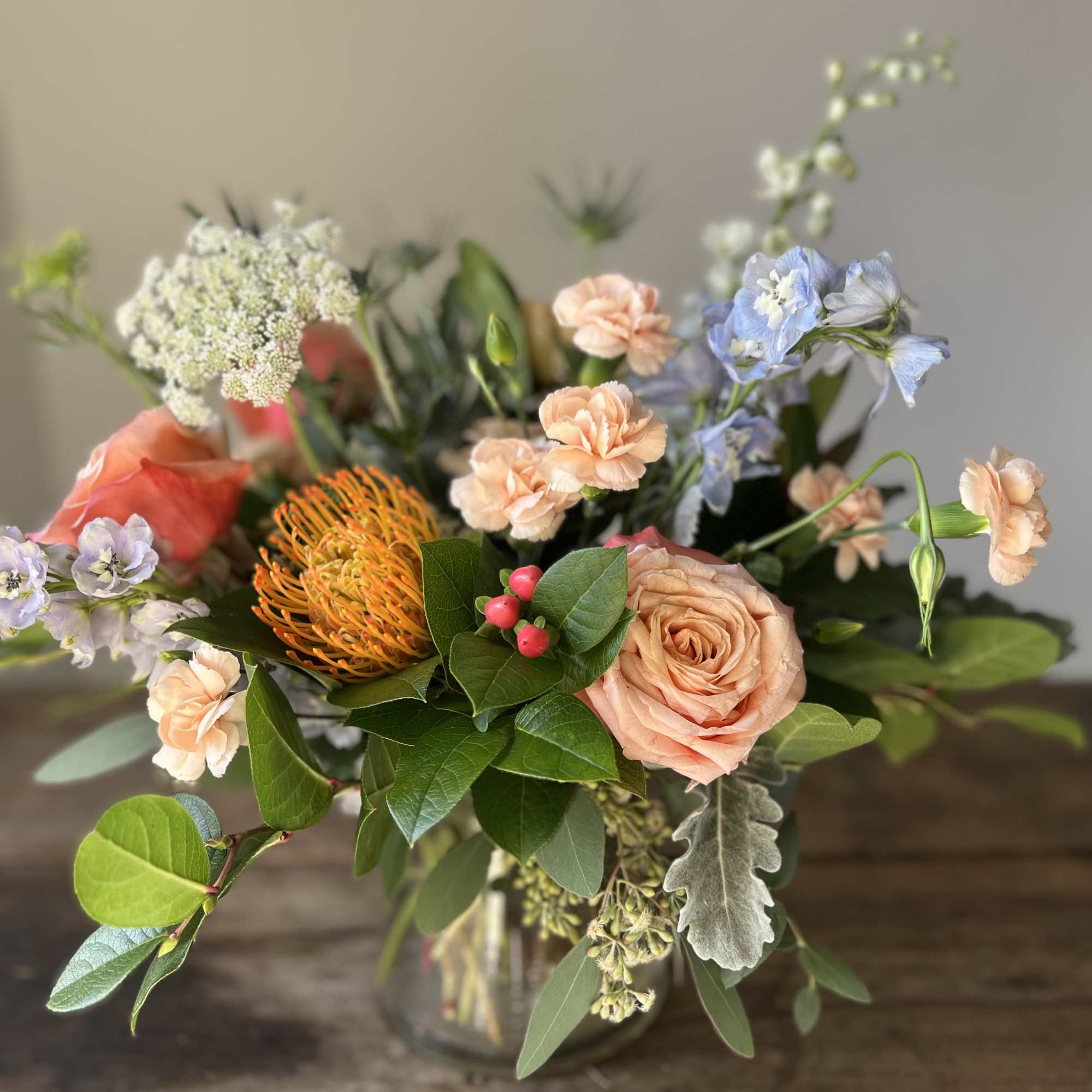 A selection of the day's finest blooms in a glass or ceramic