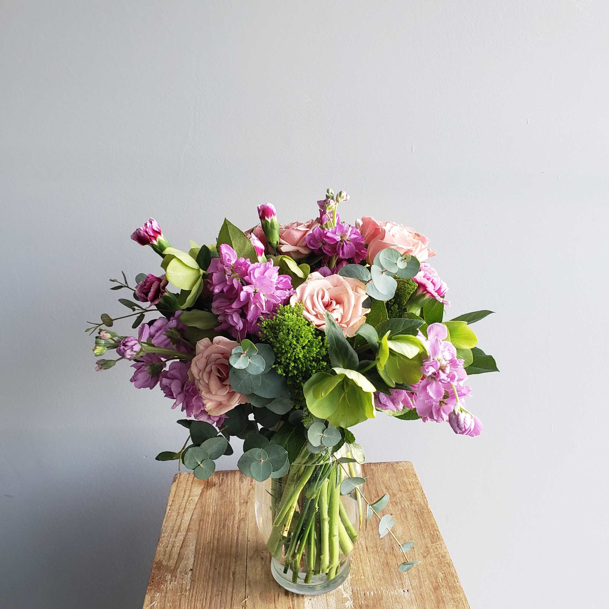 A selection of the day's finest blooms in a glass or ceramic
