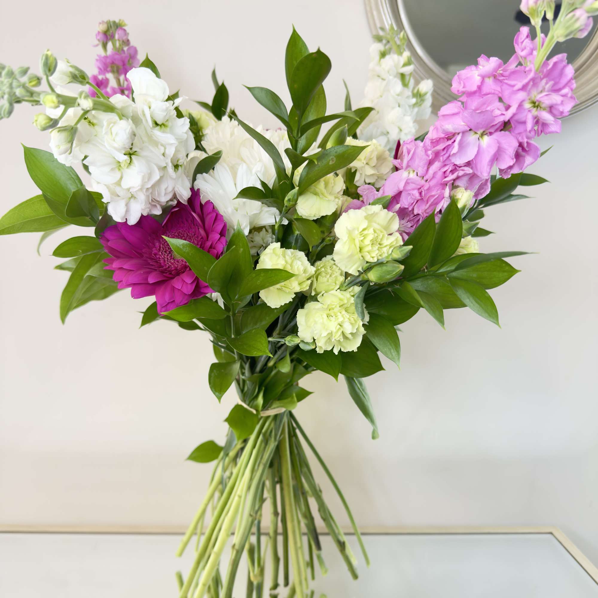 A romantic bouquet of fresh flowers in delicate colors,
hand-tied,suitable for any birthdayanniversary