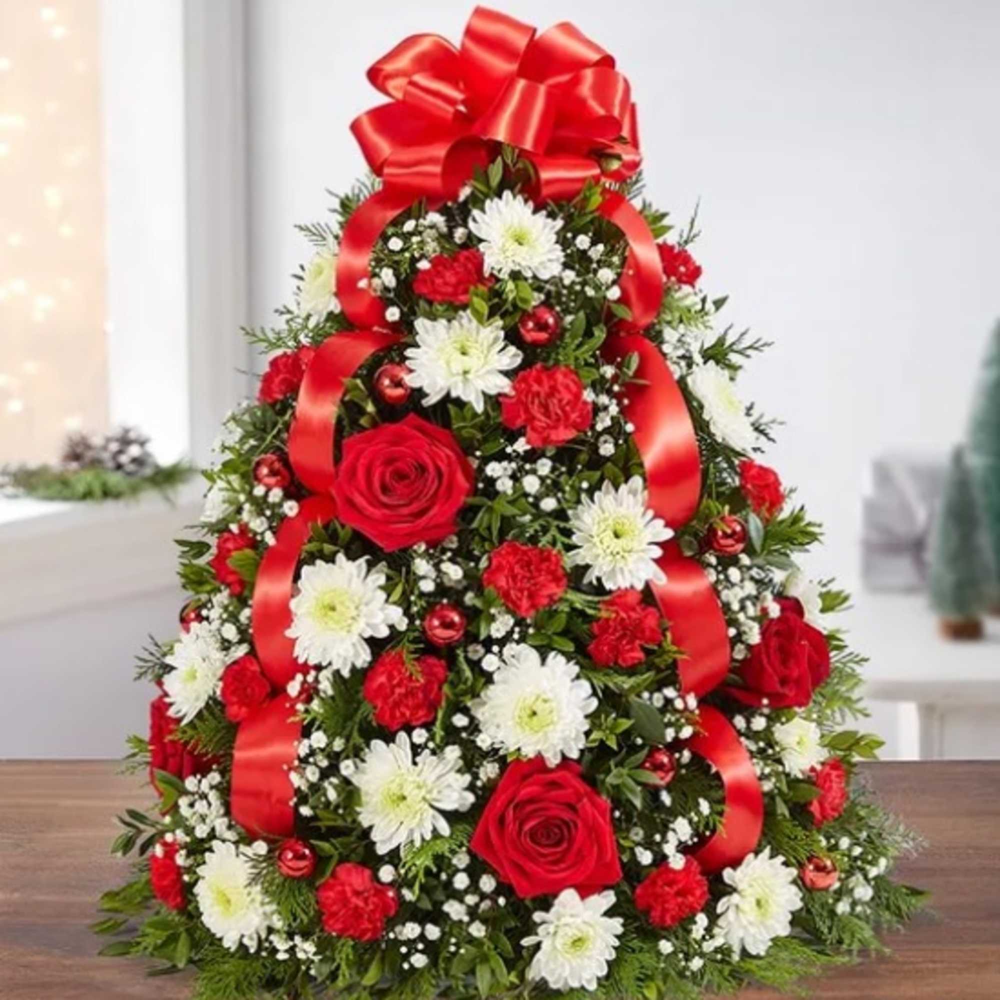 Fresh floral twist on a traditional tree makes a great gift for