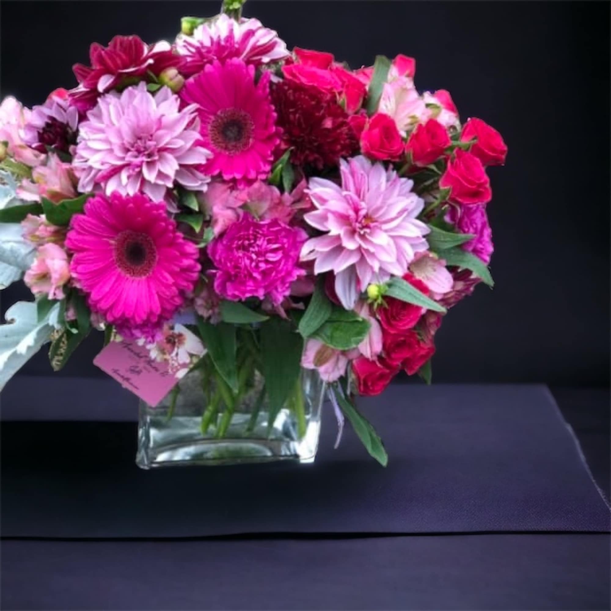 &quot;Discover the allure of our Designer&#039;s Choice Pink Tones Floral Arrangement, a